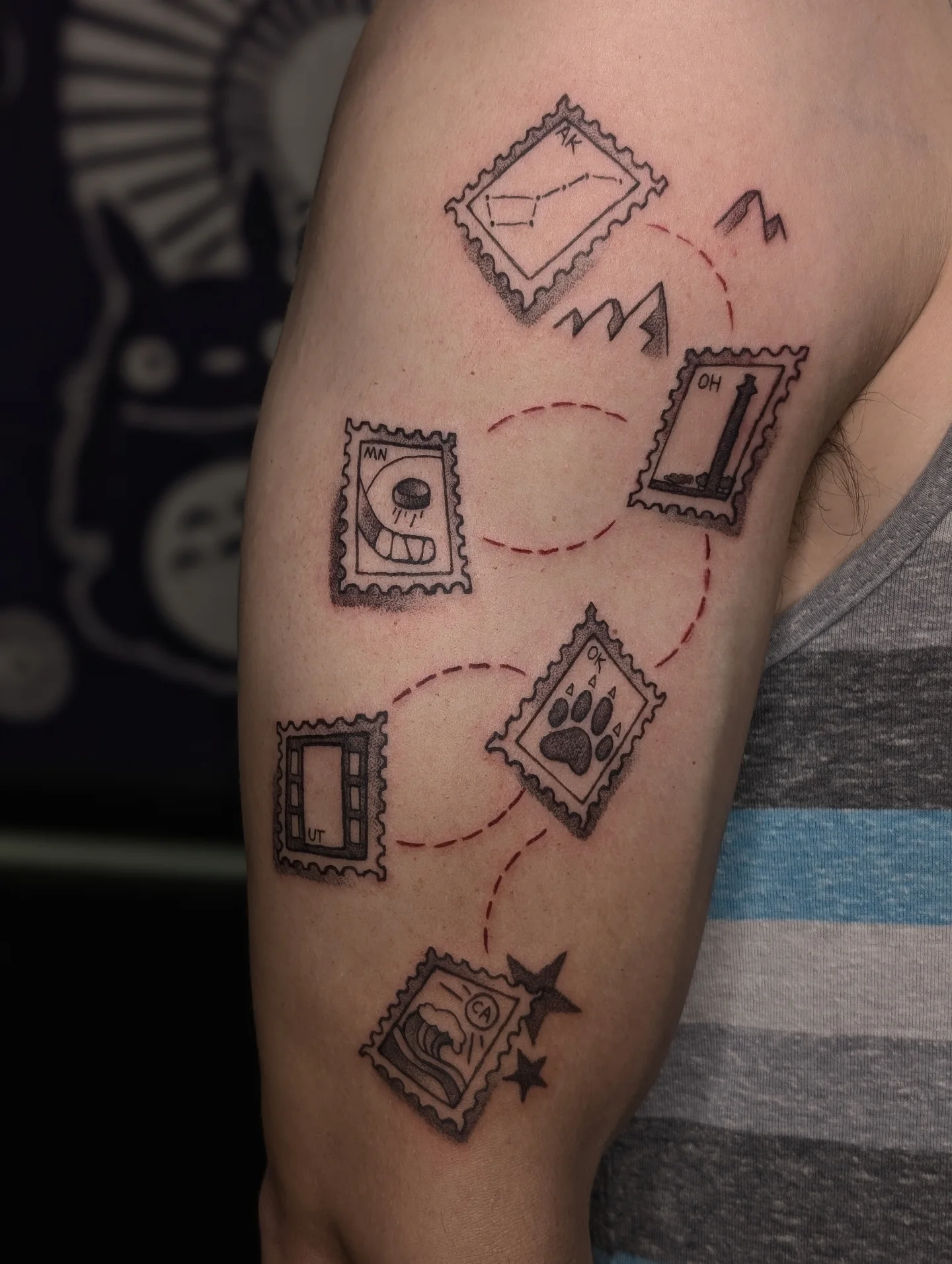 Postage stamps black and grey tattoo on the forearm by ⓢⓐⓜ ✧*。