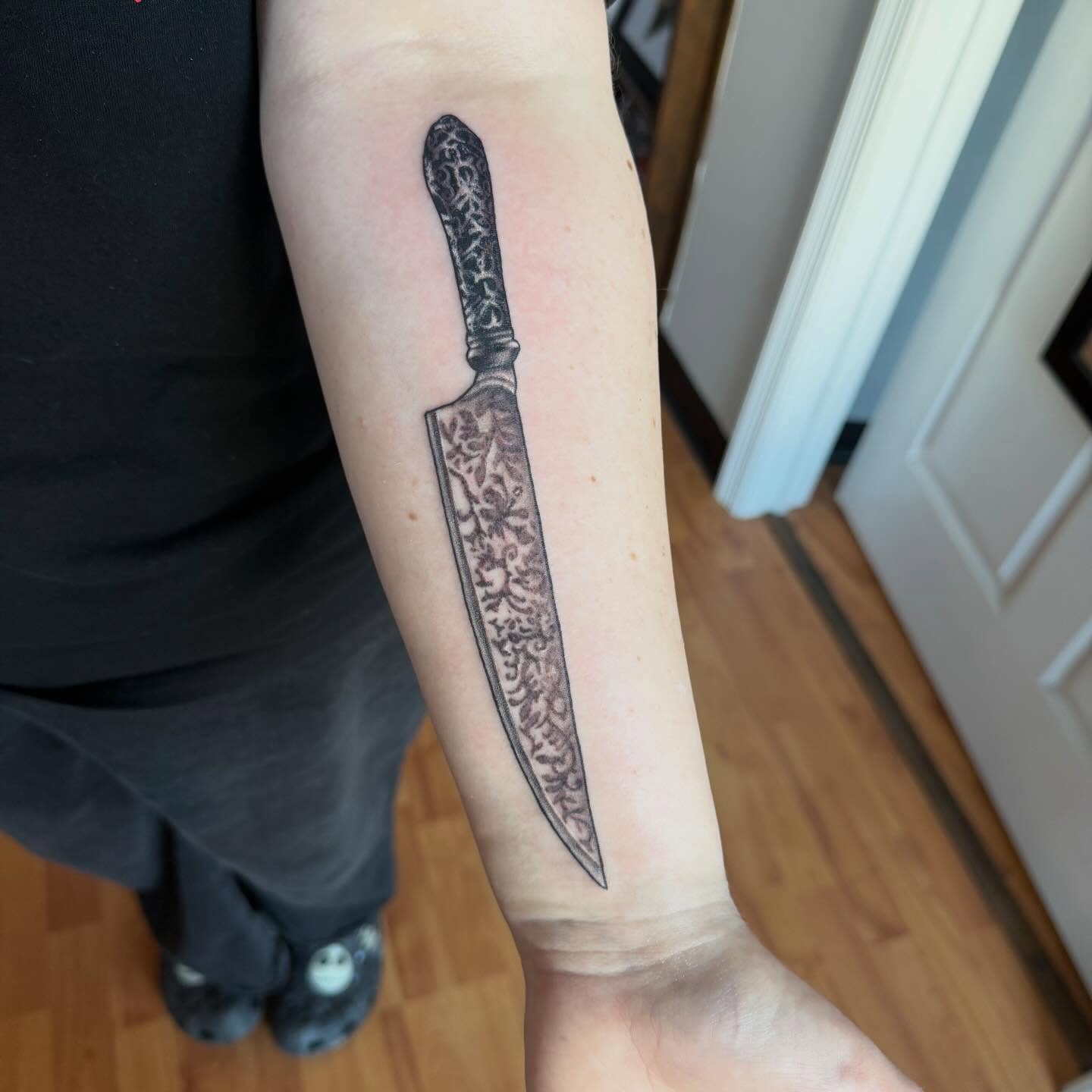 Knife realism tattoo on the forearm by Matt Hattaway