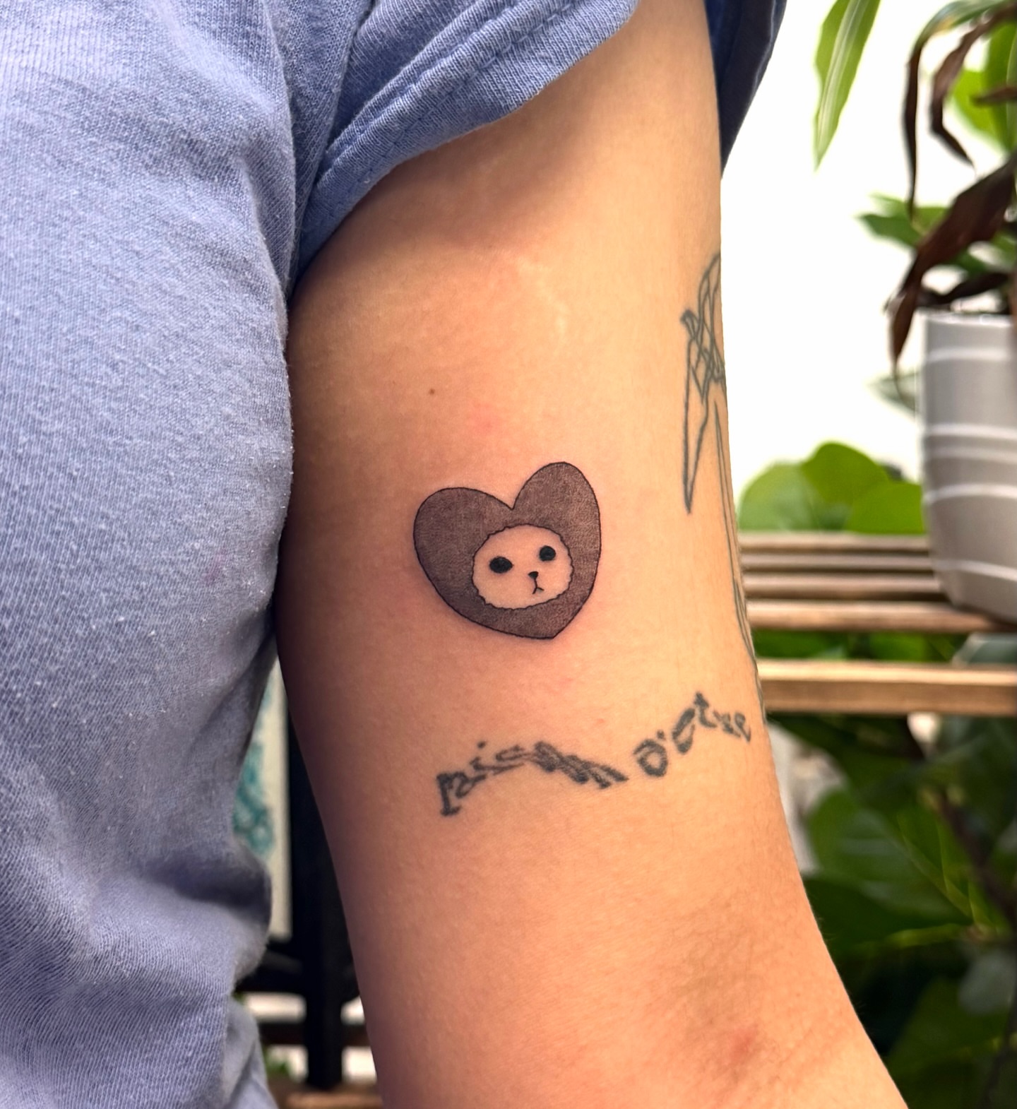 Lion in heart dotwork tattoo on the forearm by Xin Huang