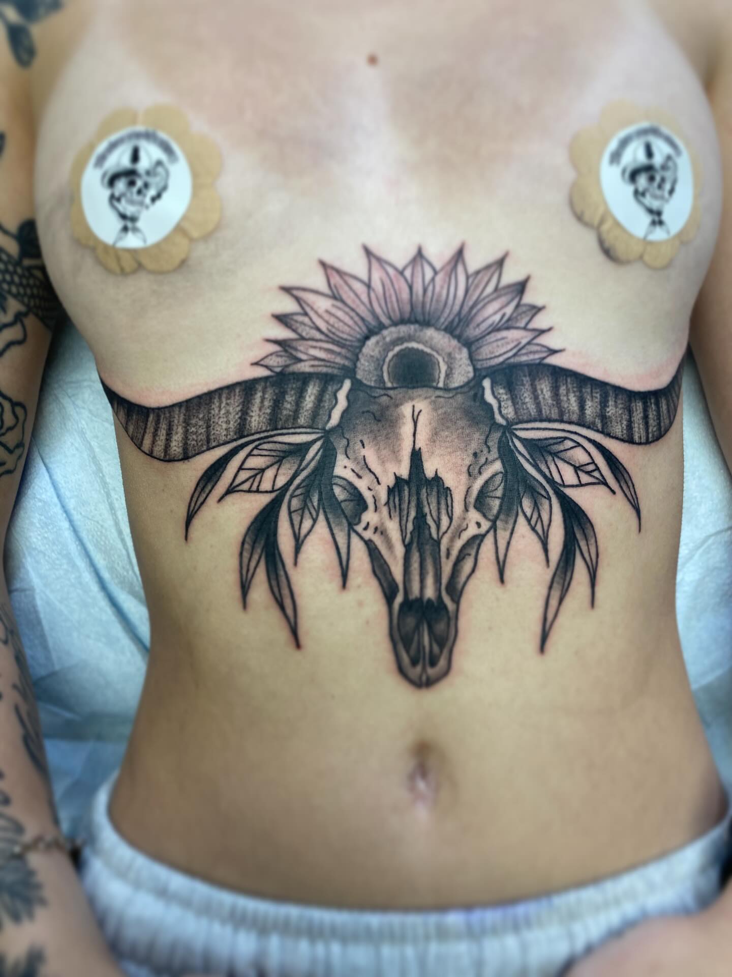 Tattoo by @meadowzmodificationz — black_and_grey