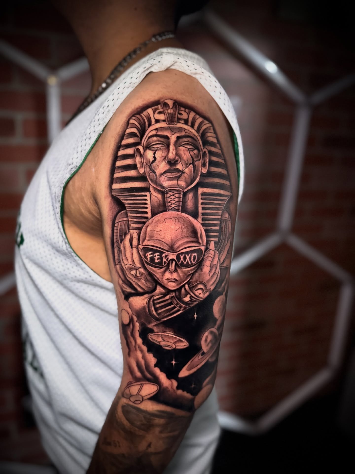 Pharaoh and alien realism tattoo on the forearm by Andres Calvo🇺🇸🇨🇴