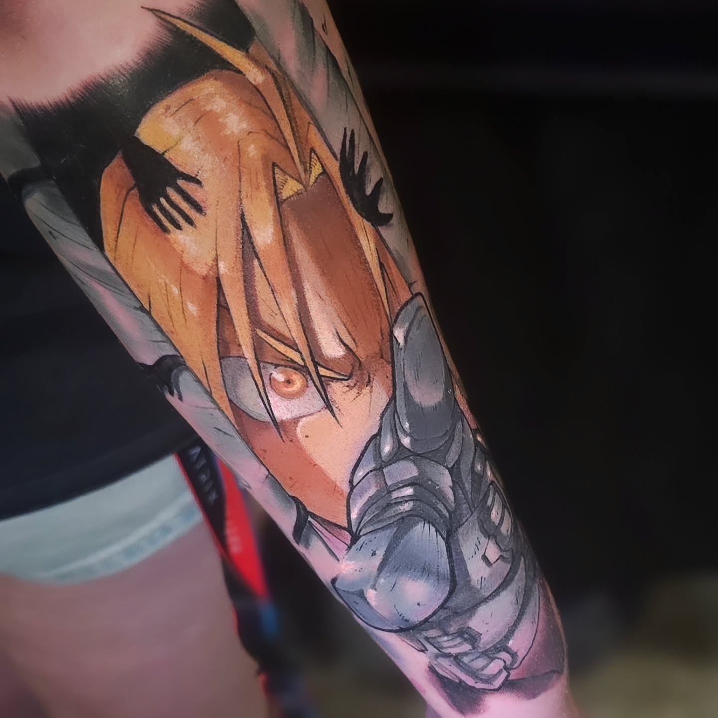 Anime character anime tattoo on the forearm by Cody Gower Tattoo Artist
