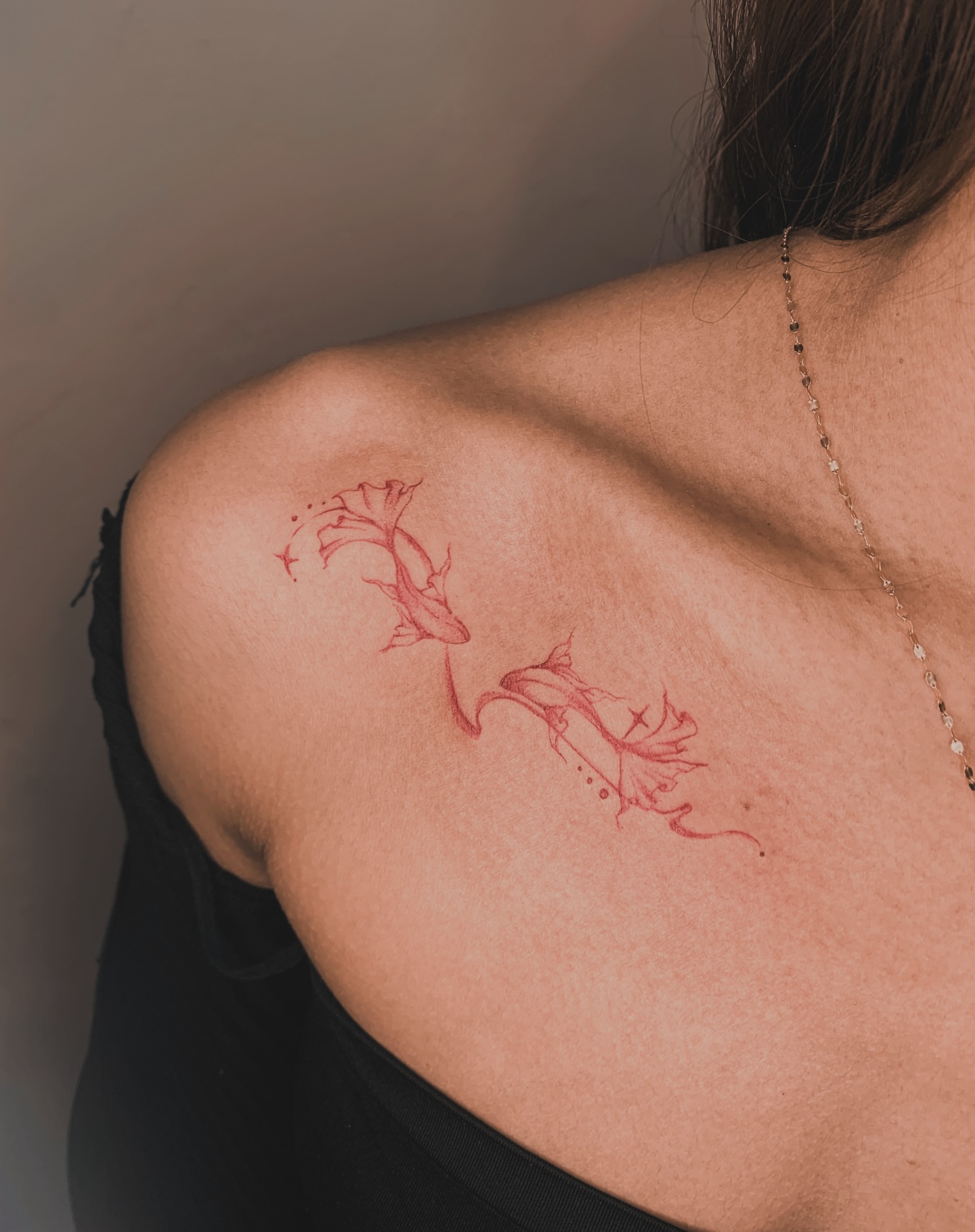 Fish dotwork tattoo on the shoulder by 21 tattooist