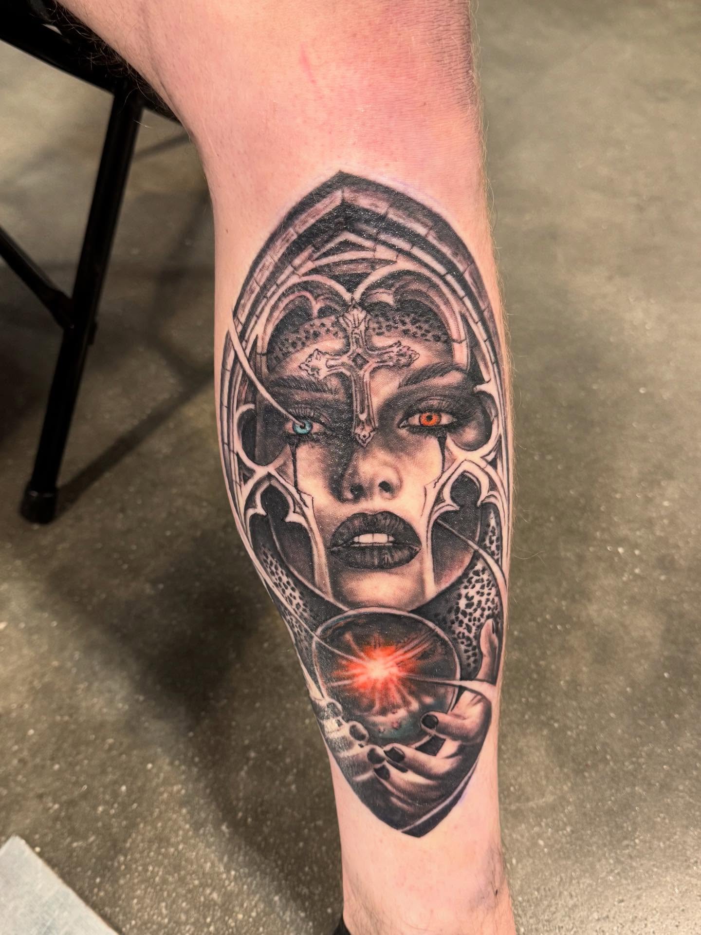 Woman with crystal ball realism tattoo on the forearm by Shawn Skale