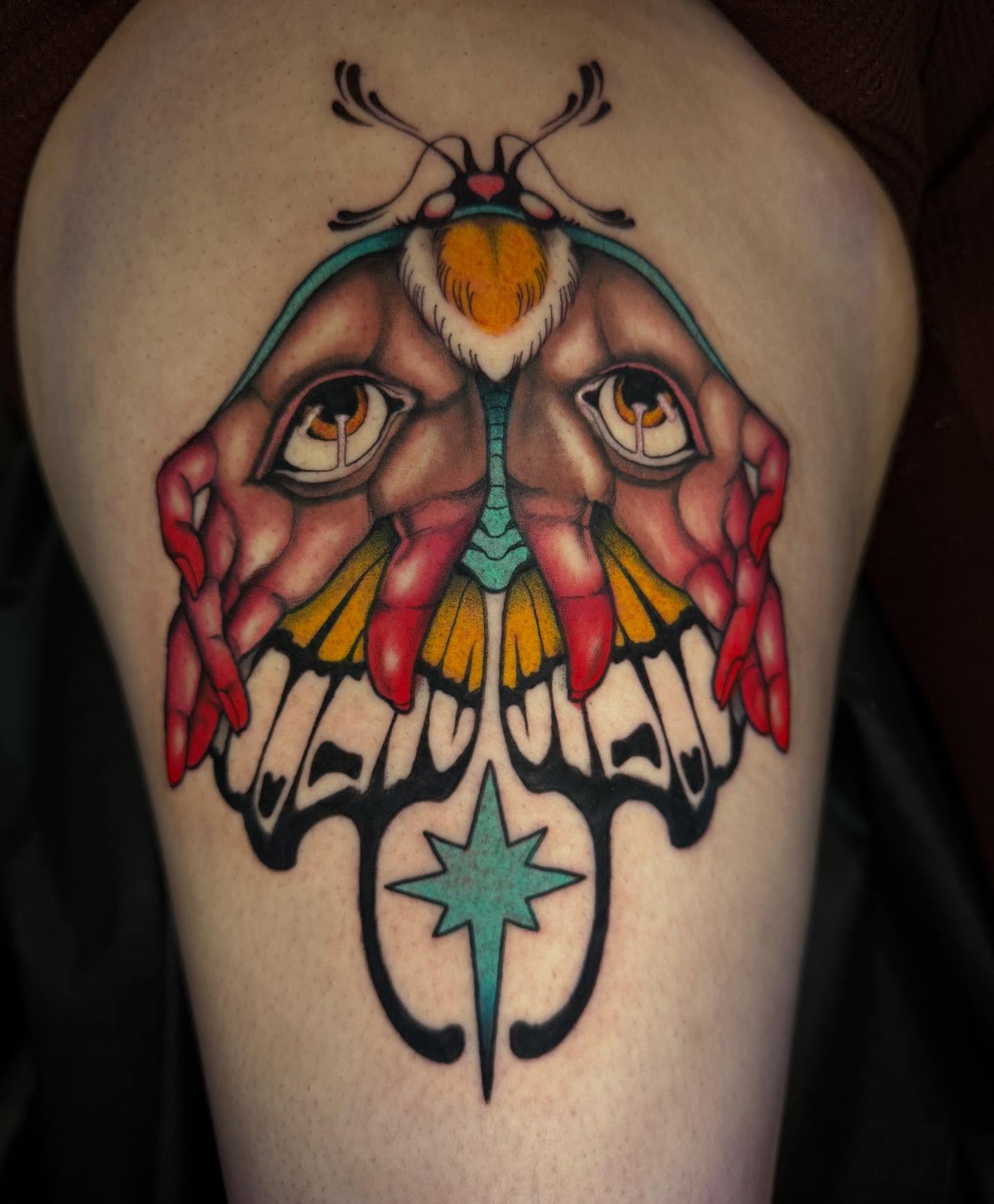 Moth American traditional tattoo on the thigh by Kaitlyn Brebner