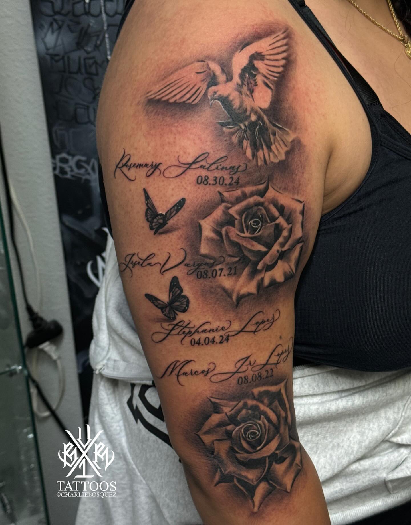 Rose and dove realism tattoo on the upper arm by El Beaver Tattoos