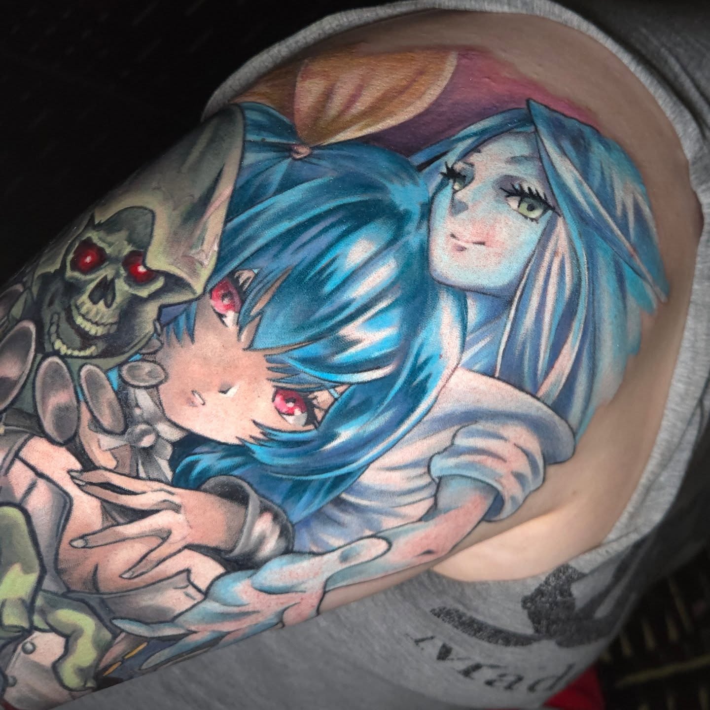 Anime characters anime tattoo on the shoulder by Nic Mann