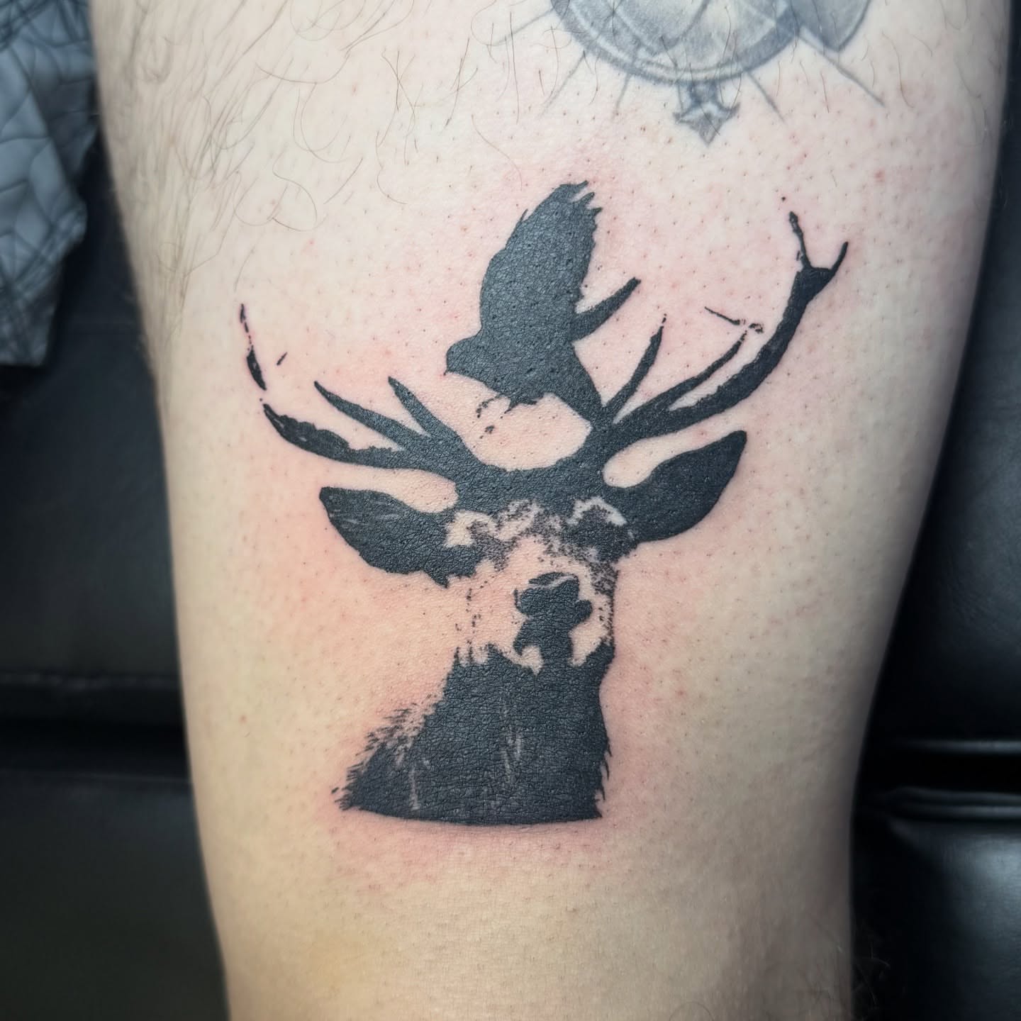 Deer head with bird black and grey tattoo on the thigh by 🌸Blossom🌸