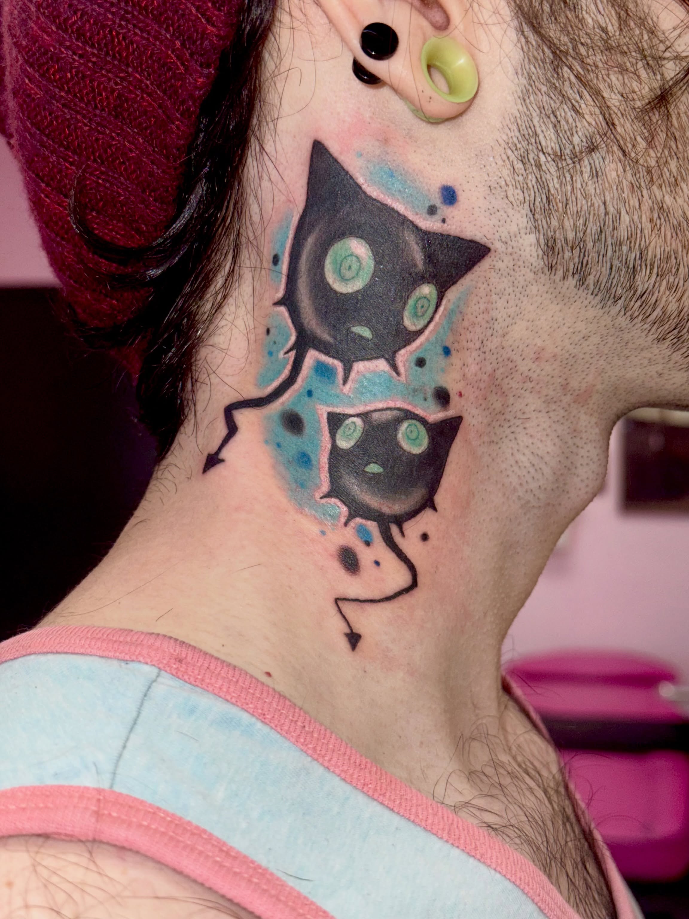 Two cats dotwork tattoo on the neck by Caitlynn Austin