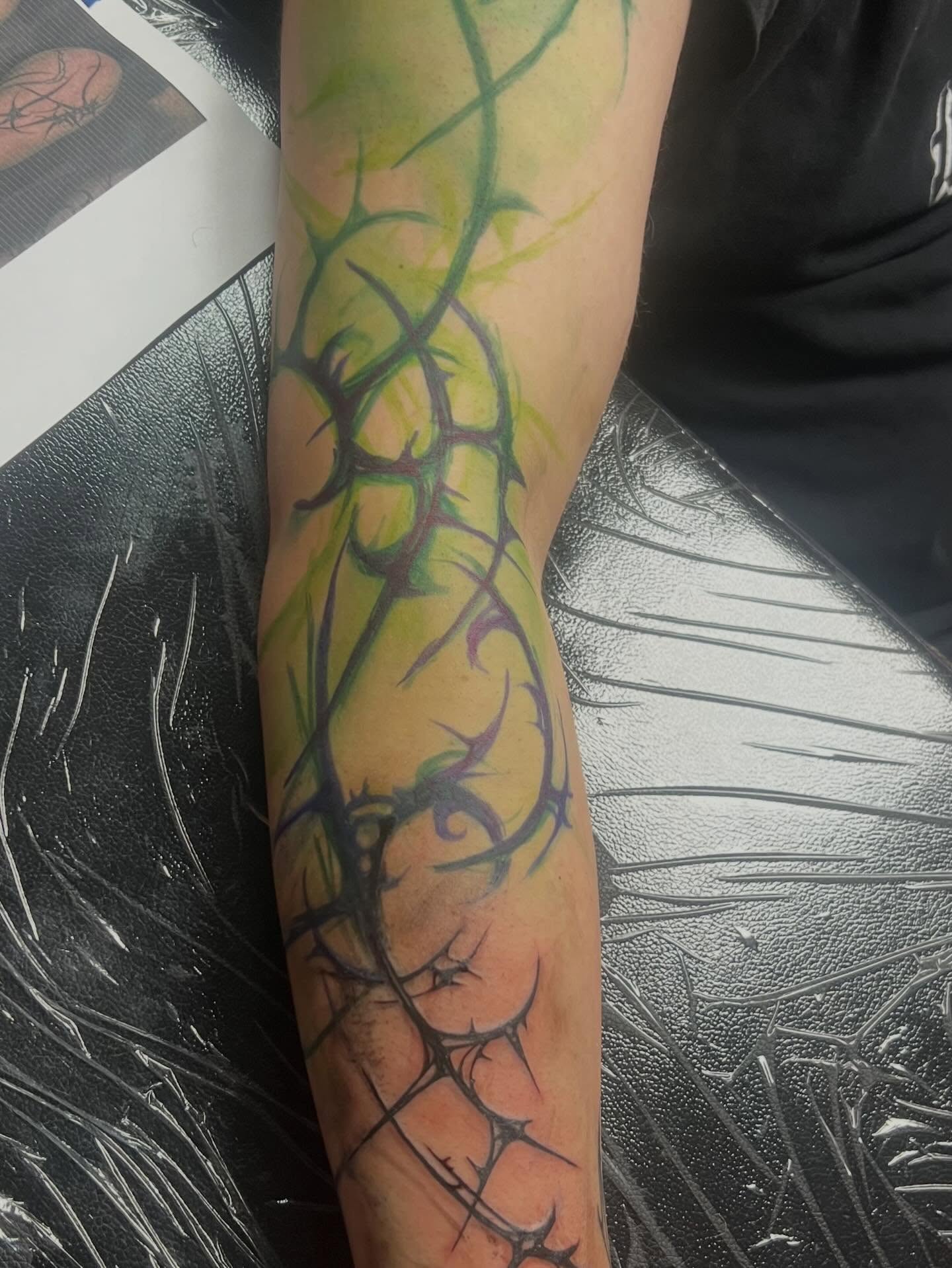 Thorns watercolor tattoo on the forearm by Callie πͺ