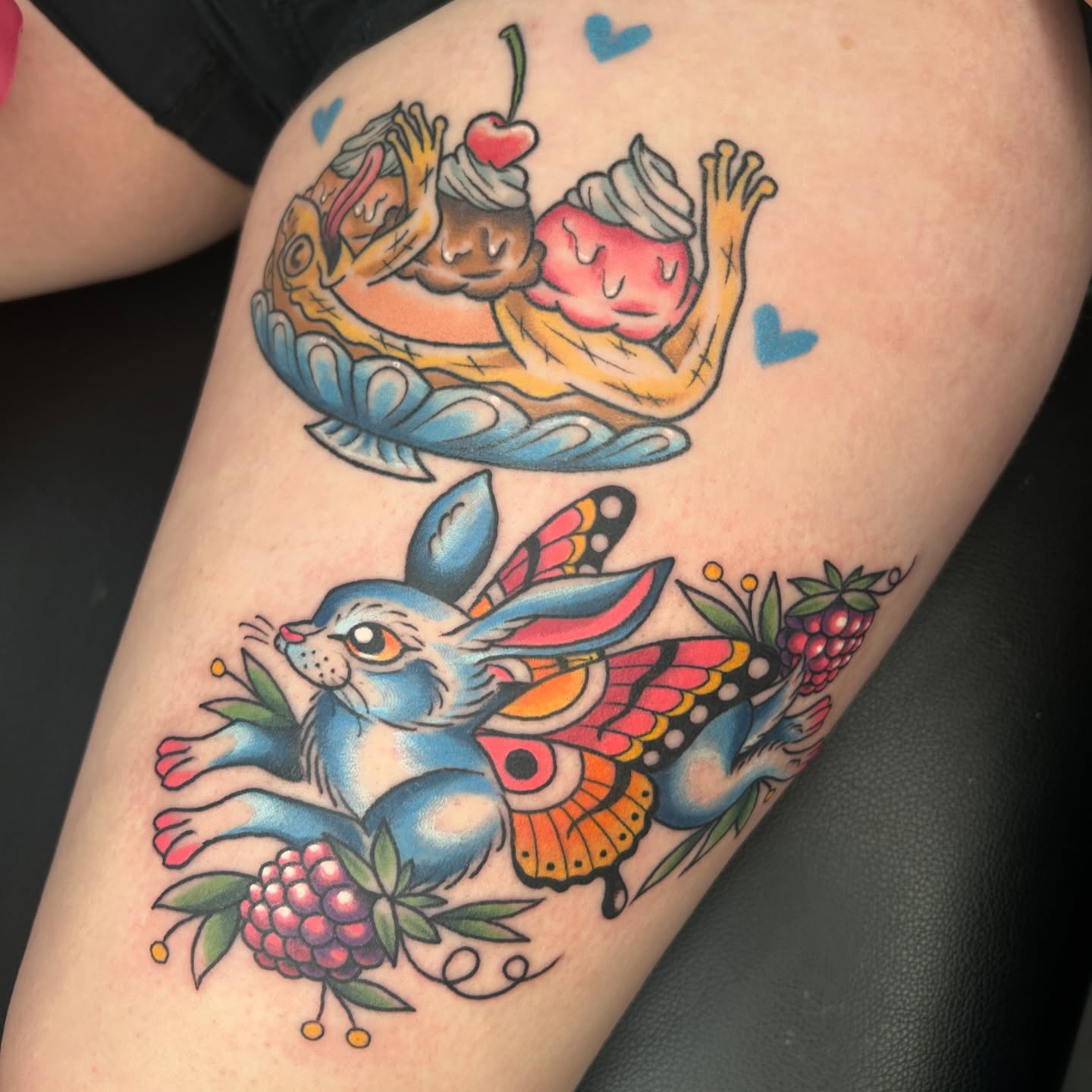 Rabbit and butterfly American traditional tattoo on the thigh by Audrey Migitsch
