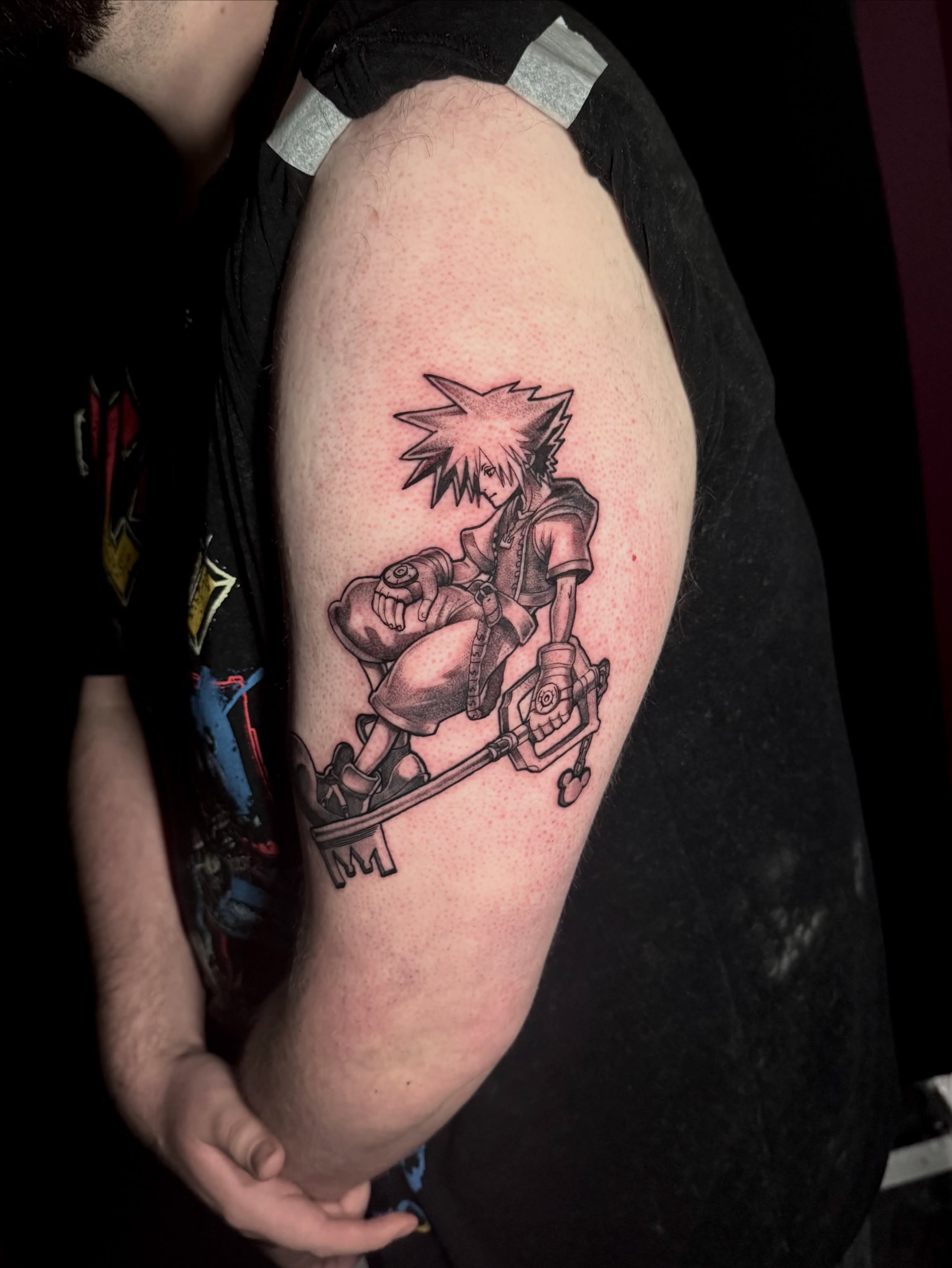 Keyblade warrior anime tattoo on the forearm by Dante Singh