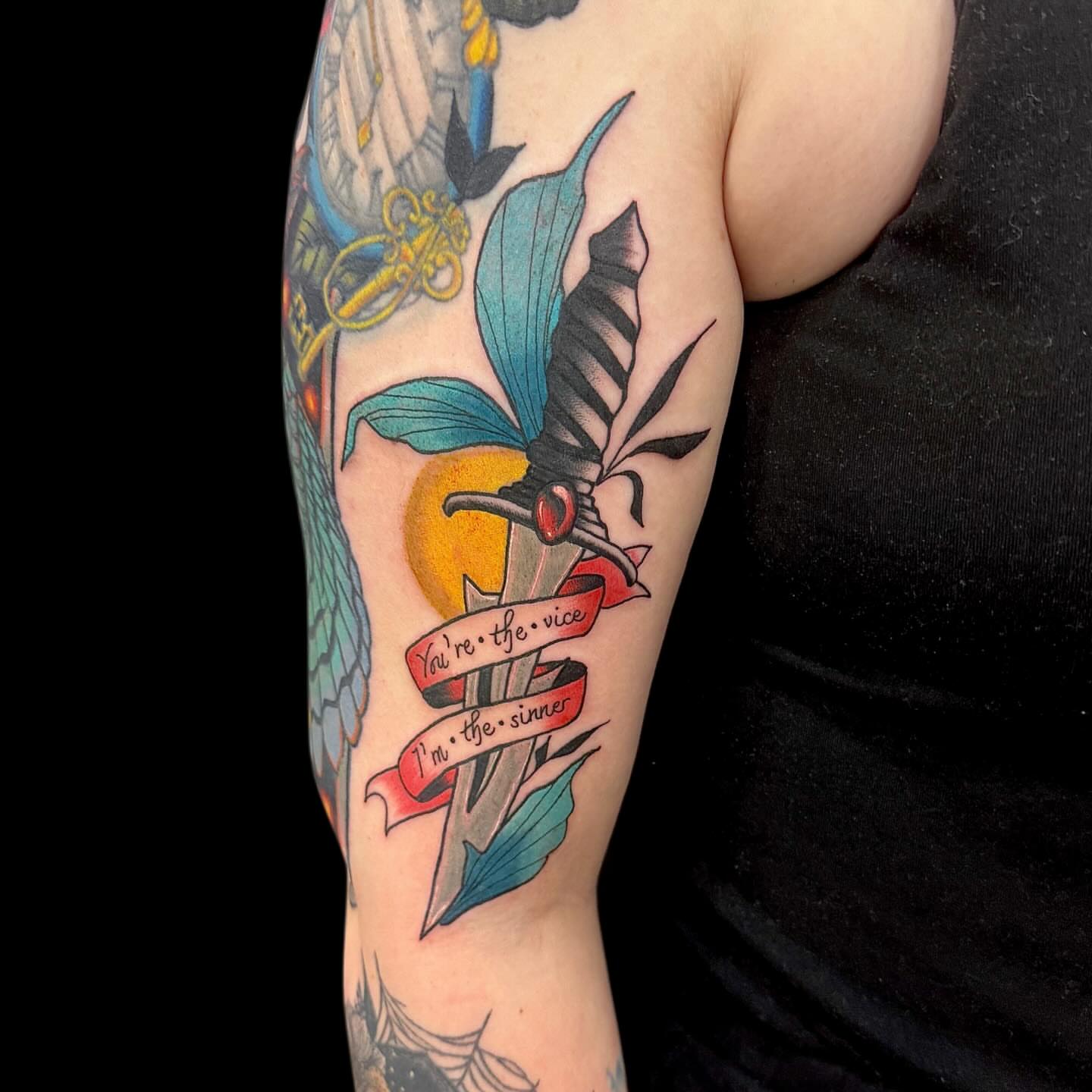 Sword and banner American traditional tattoo on the forearm by Abby Ash, Belington, West Virginia