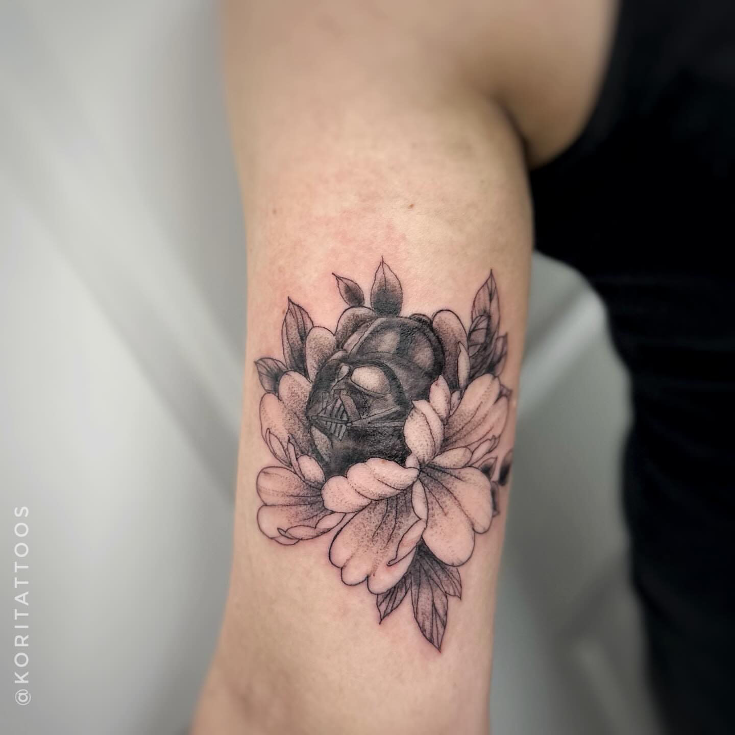Flower with skull dotwork tattoo on the forearm by Kori Millhimes