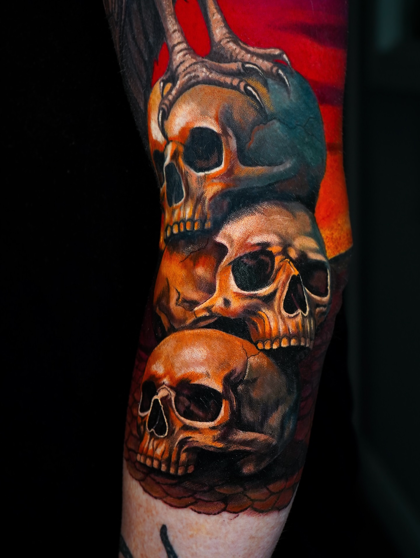 Skulls realism tattoo on the forearm by Luis Gil