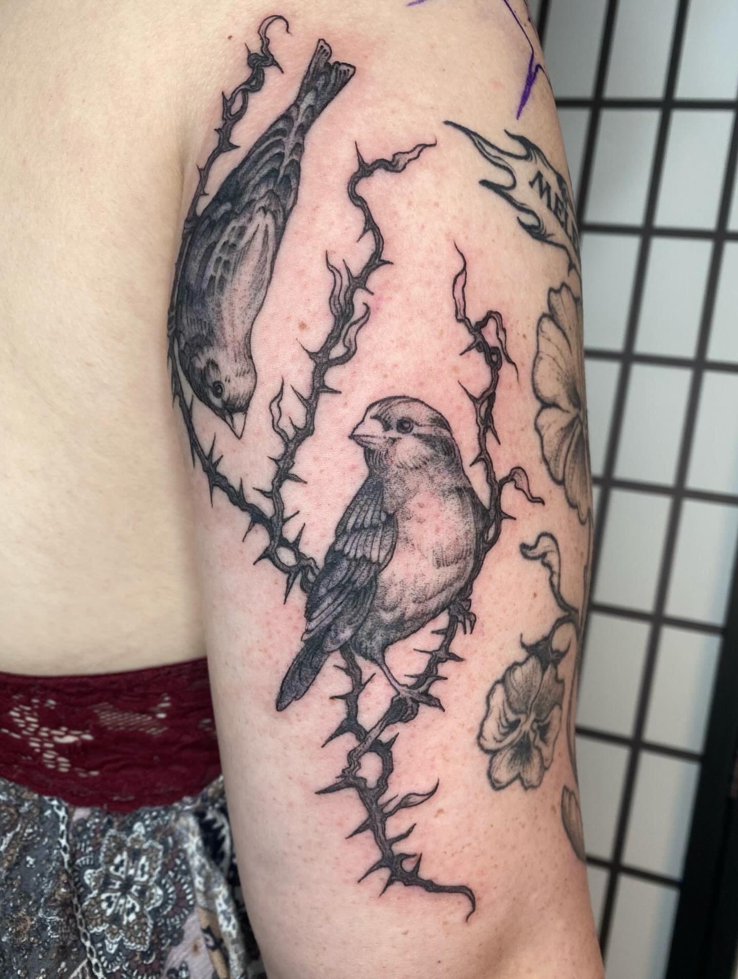Birds and thorns realism tattoo on the forearm by sarah 🗝️