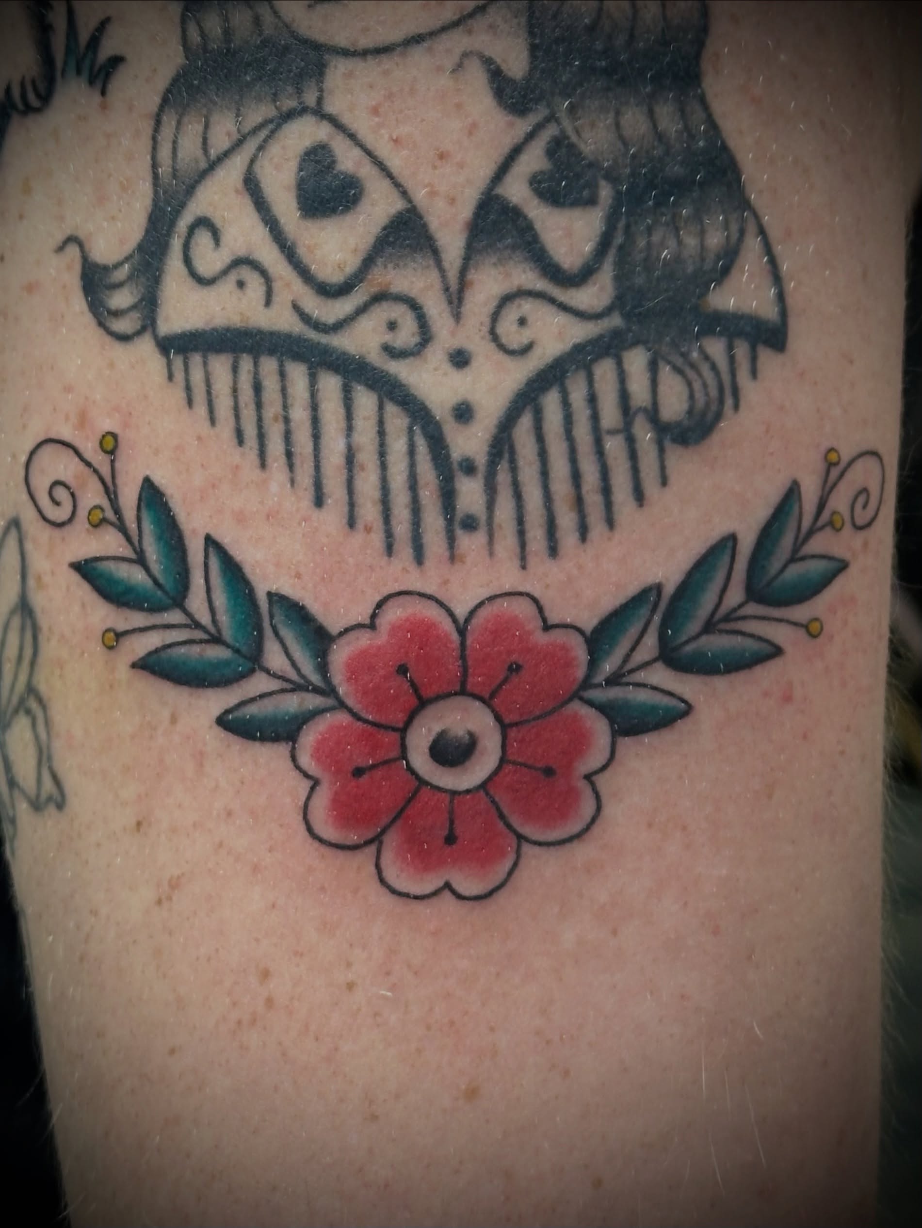 Skull and flower American traditional tattoo on the forearm by 🥀Chloe Miller