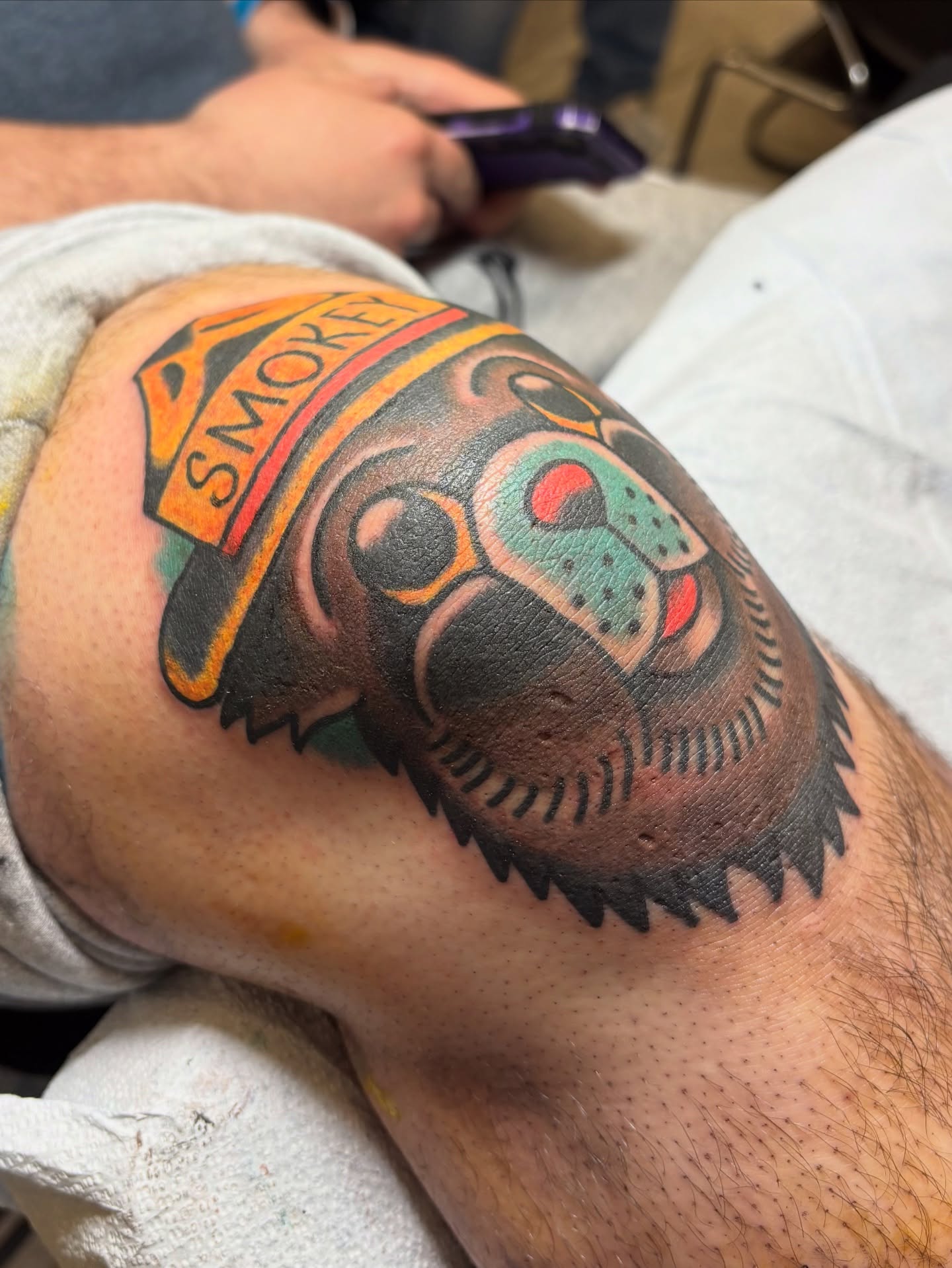 Smokey bear American traditional tattoo on the shoulder by Jake Herbert, Knoxville, Tennessee