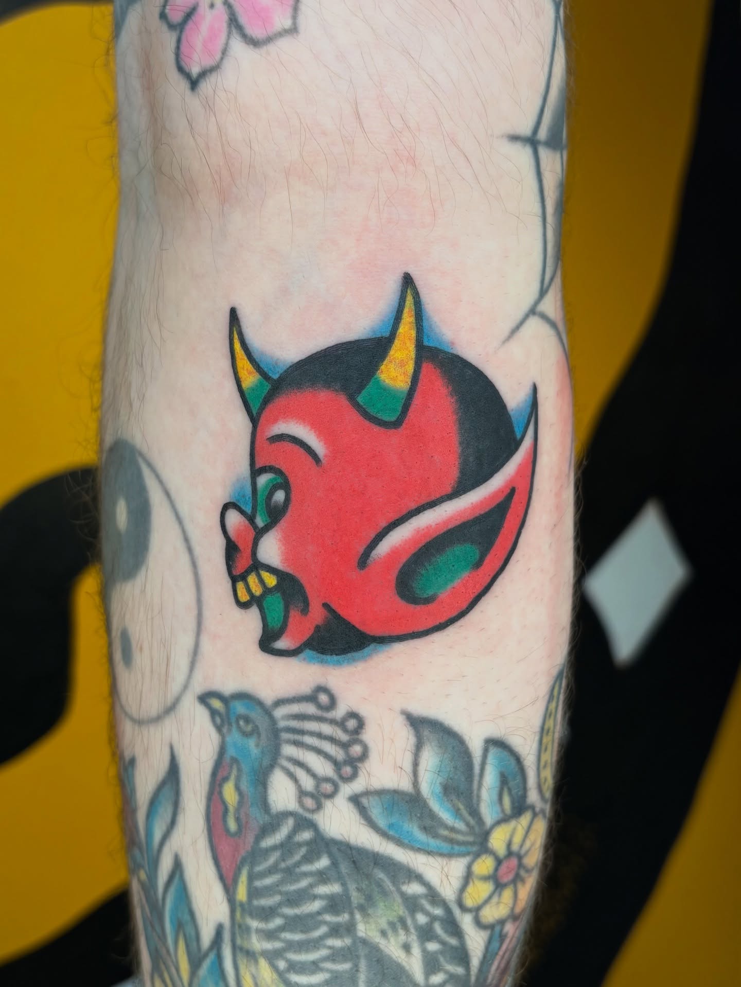 Red devil American traditional tattoo on the forearm by Jake Herbert, Knoxville, Tennessee