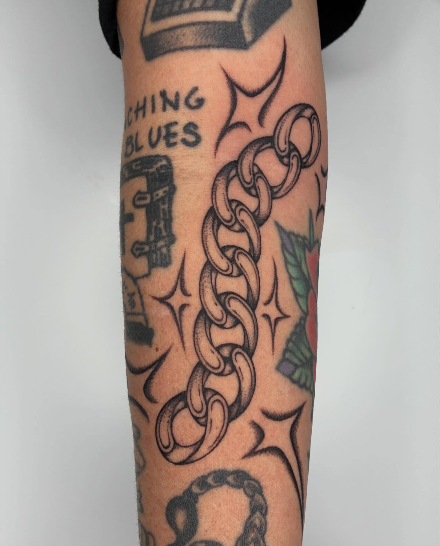 Chain American traditional tattoo on the forearm by Steven Sessler, San Francisco, California