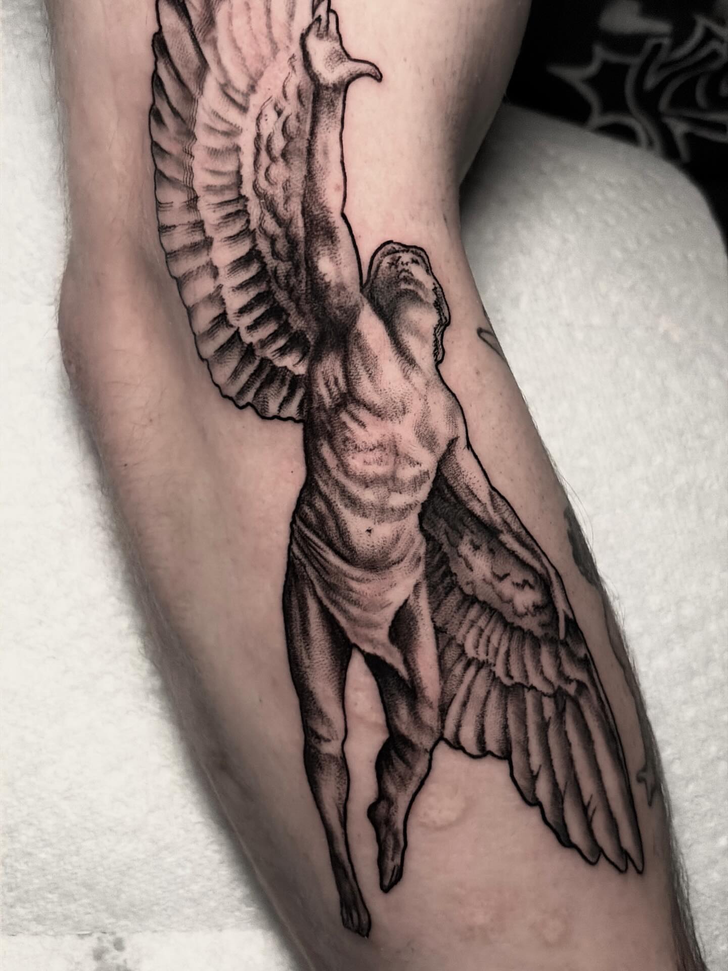Angel realism tattoo on the forearm by Ashley Denise
