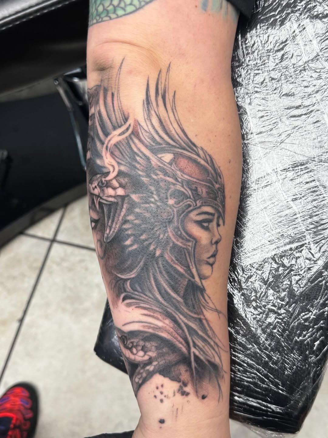 Tattoo by @tha_hot_dawg — realism, black_and_grey