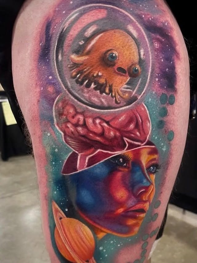Astronaut alien realism tattoo on the forearm by Kodi Klo