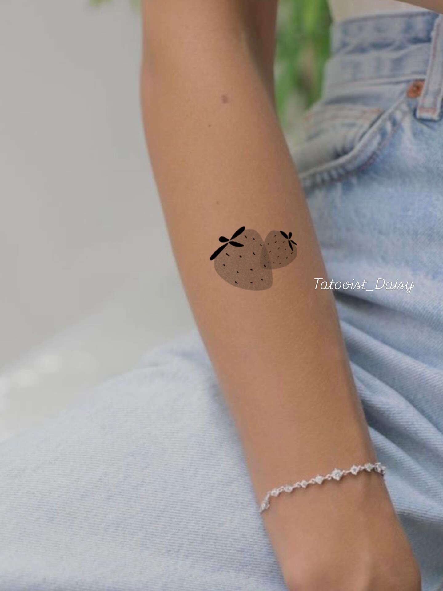 Strawberries minimalist tattoo on the forearm by Ink _daisy_