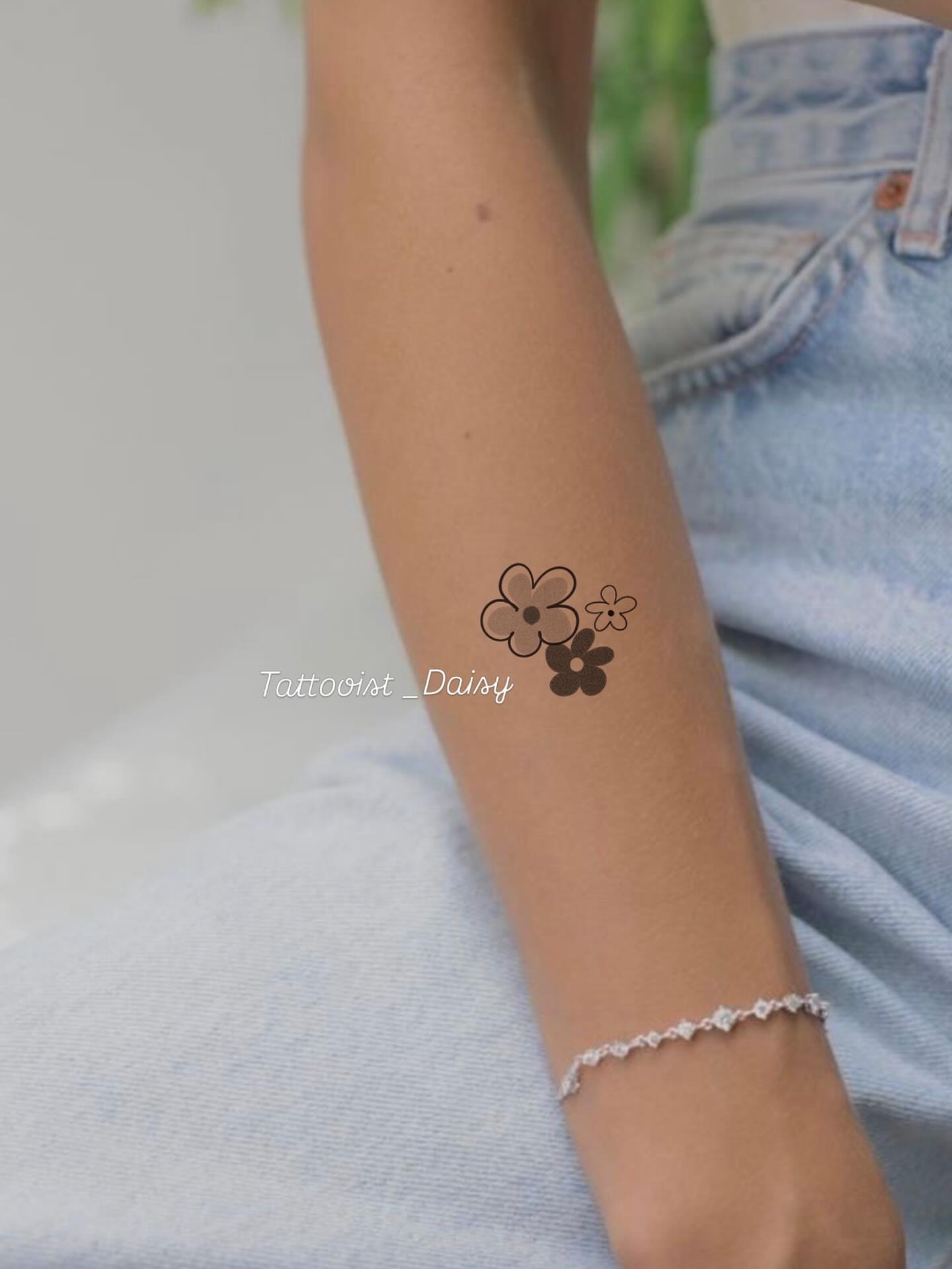 Flowers dotwork tattoo on the forearm by Ink _daisy_