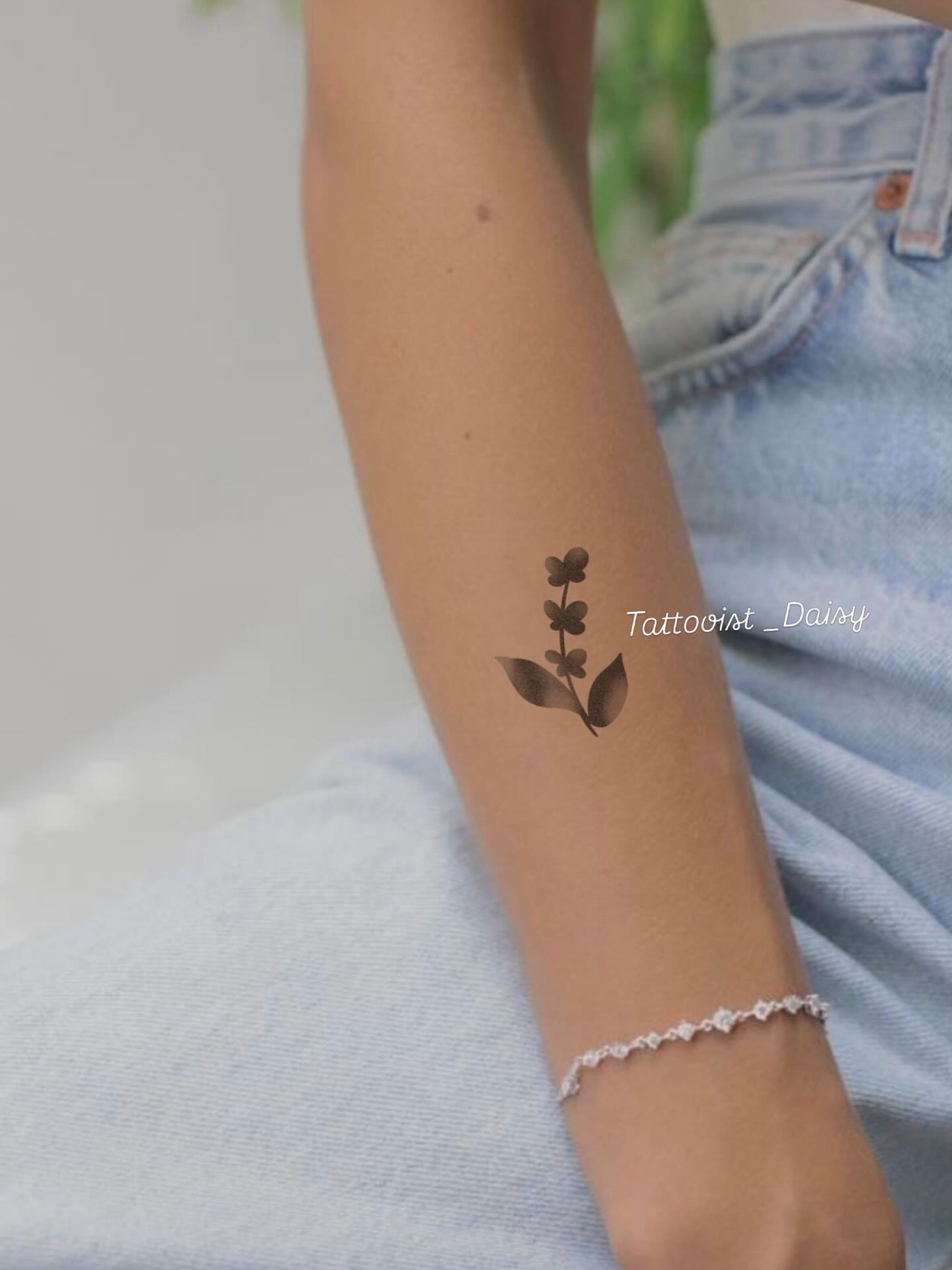 Flower black and grey tattoo on the forearm by Ink _daisy_
