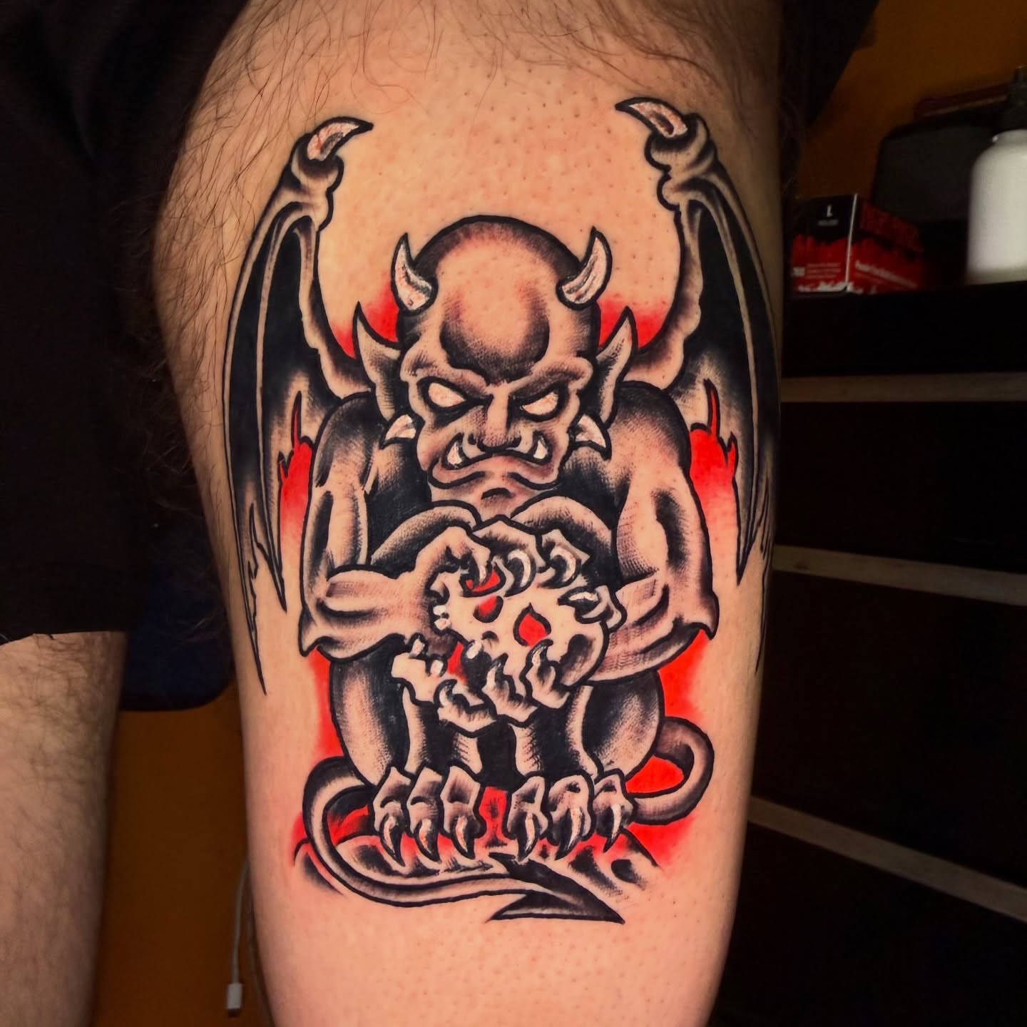 Demon American traditional tattoo on the thigh by Mike Dunn