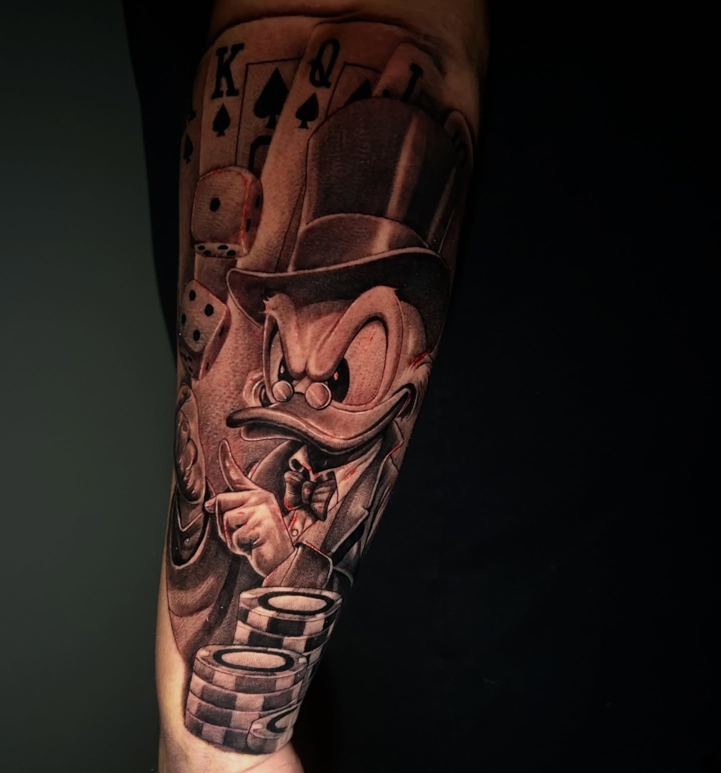 Donald duck realism tattoo on the forearm by Alex Cruz 707