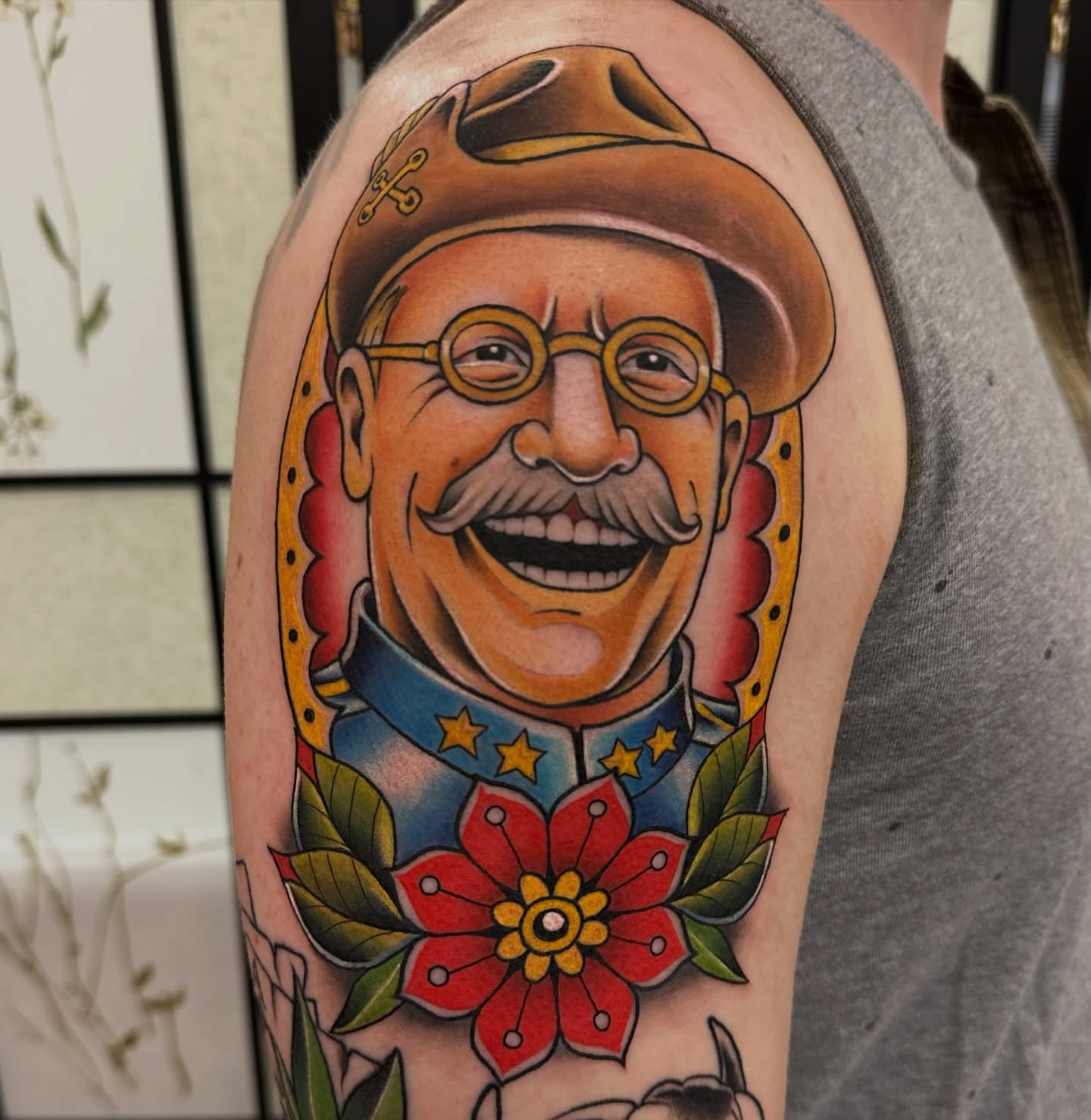 Portrait of man American traditional tattoo on the upper arm by Sam AlpineInk