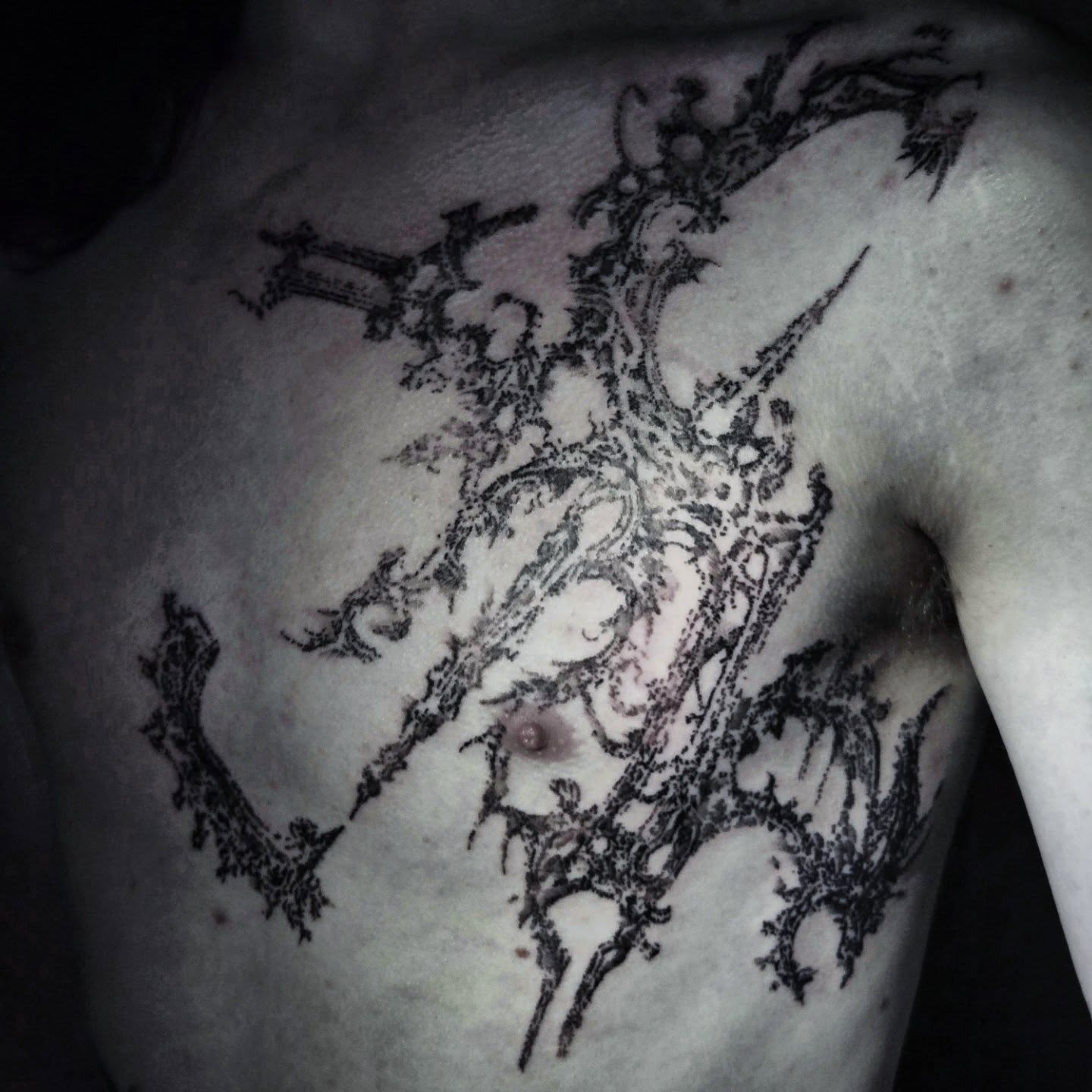 Abstract fractal black and grey tattoo on the chest by ⚙️ 𝔄𝔞𝔯𝔬𝔫 𝔇. ⚙️