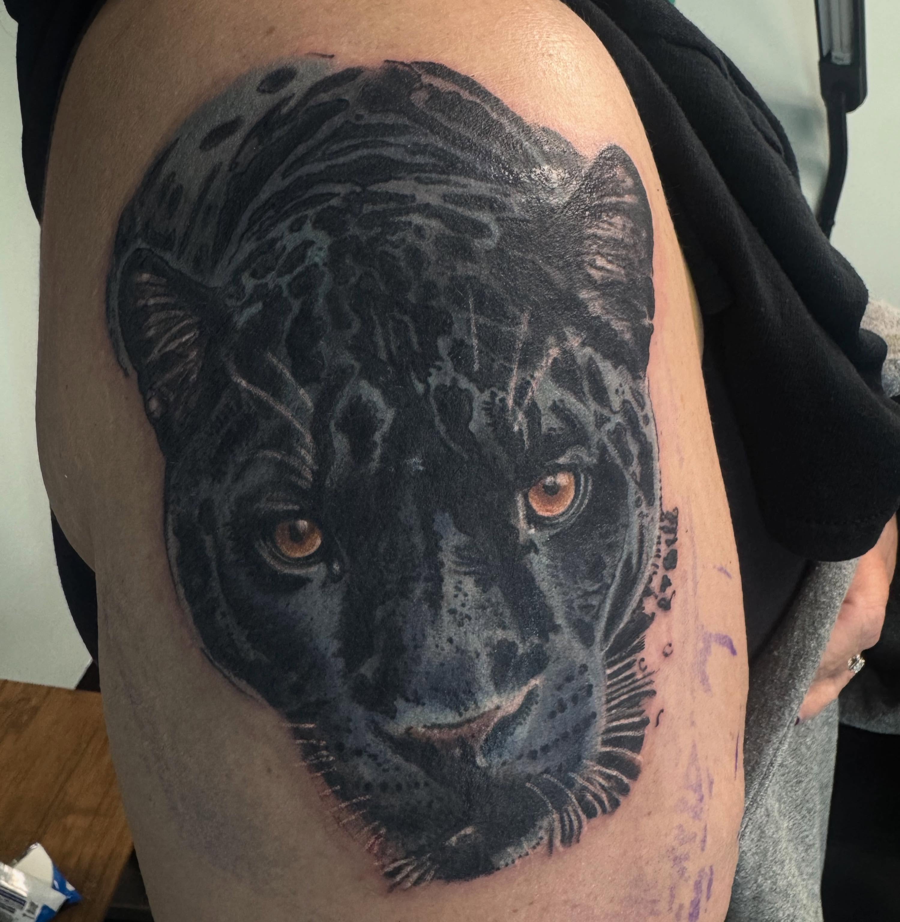 Panther realism tattoo on the shoulder by Columbus Tattoo Artist