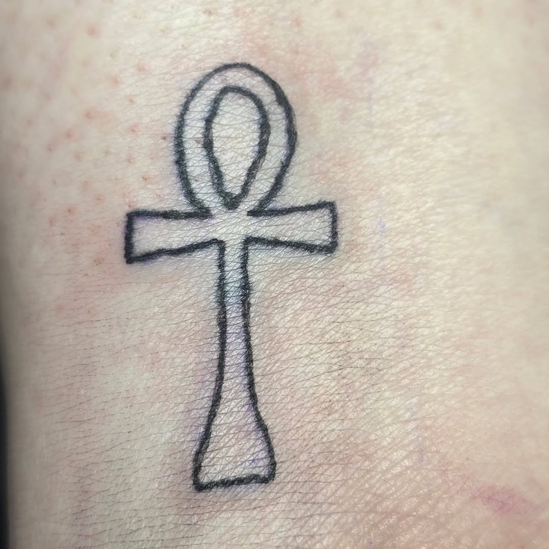 Ankh symbol tattoo on the forearm by Catherine B