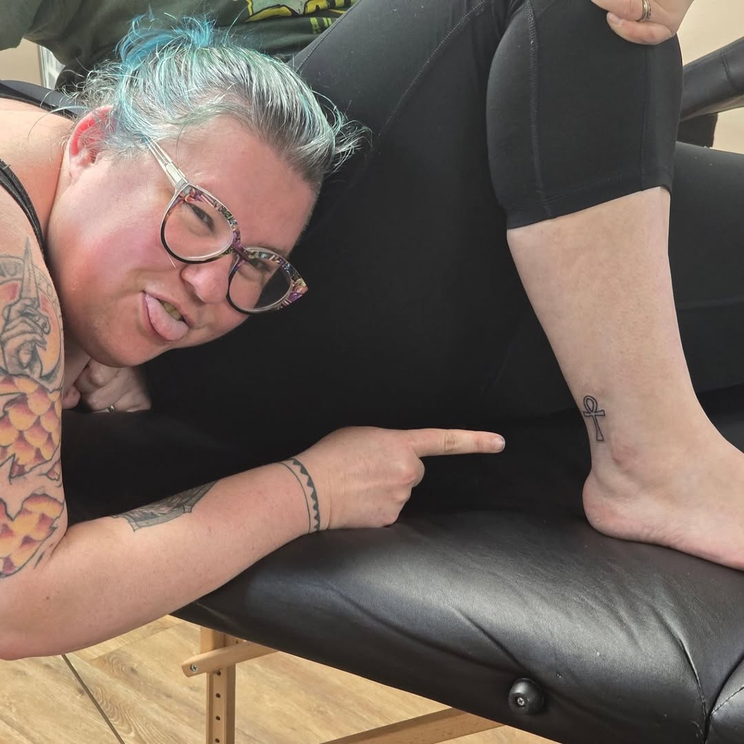 Ankh symbol tattoo on the foot by Catherine B