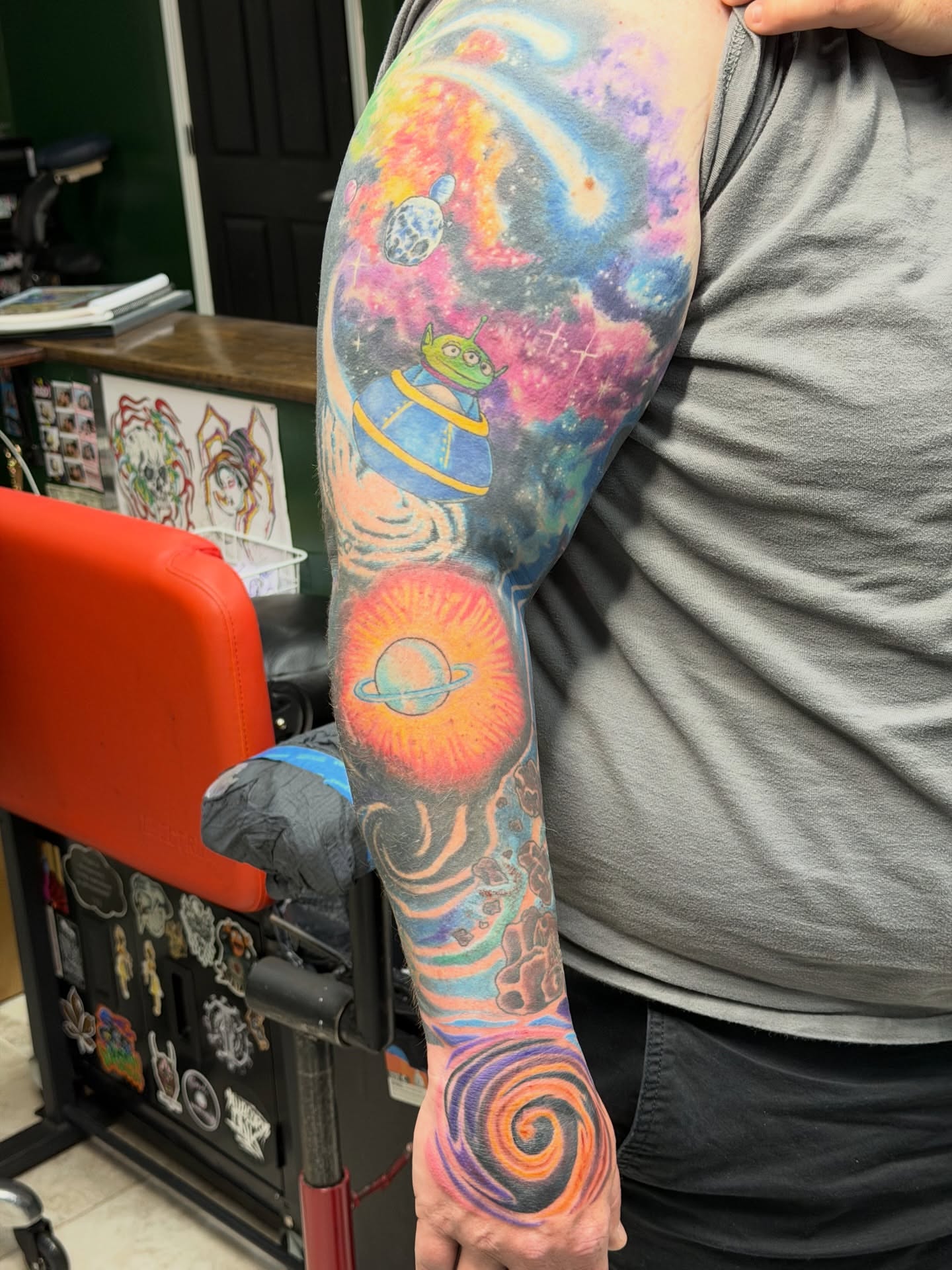 Space-themed tattoo new school tattoo on the forearm by Squid