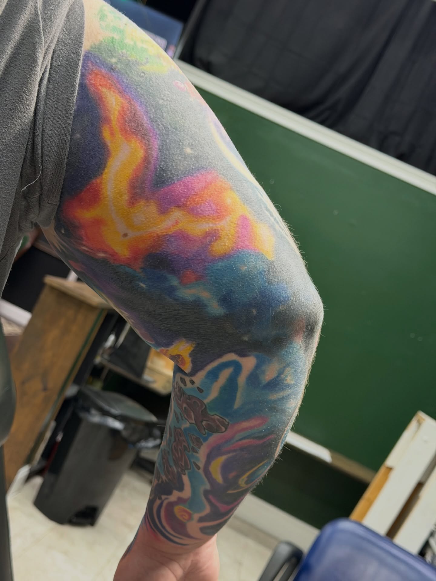 Abstract landscape new school tattoo on the forearm by Squid