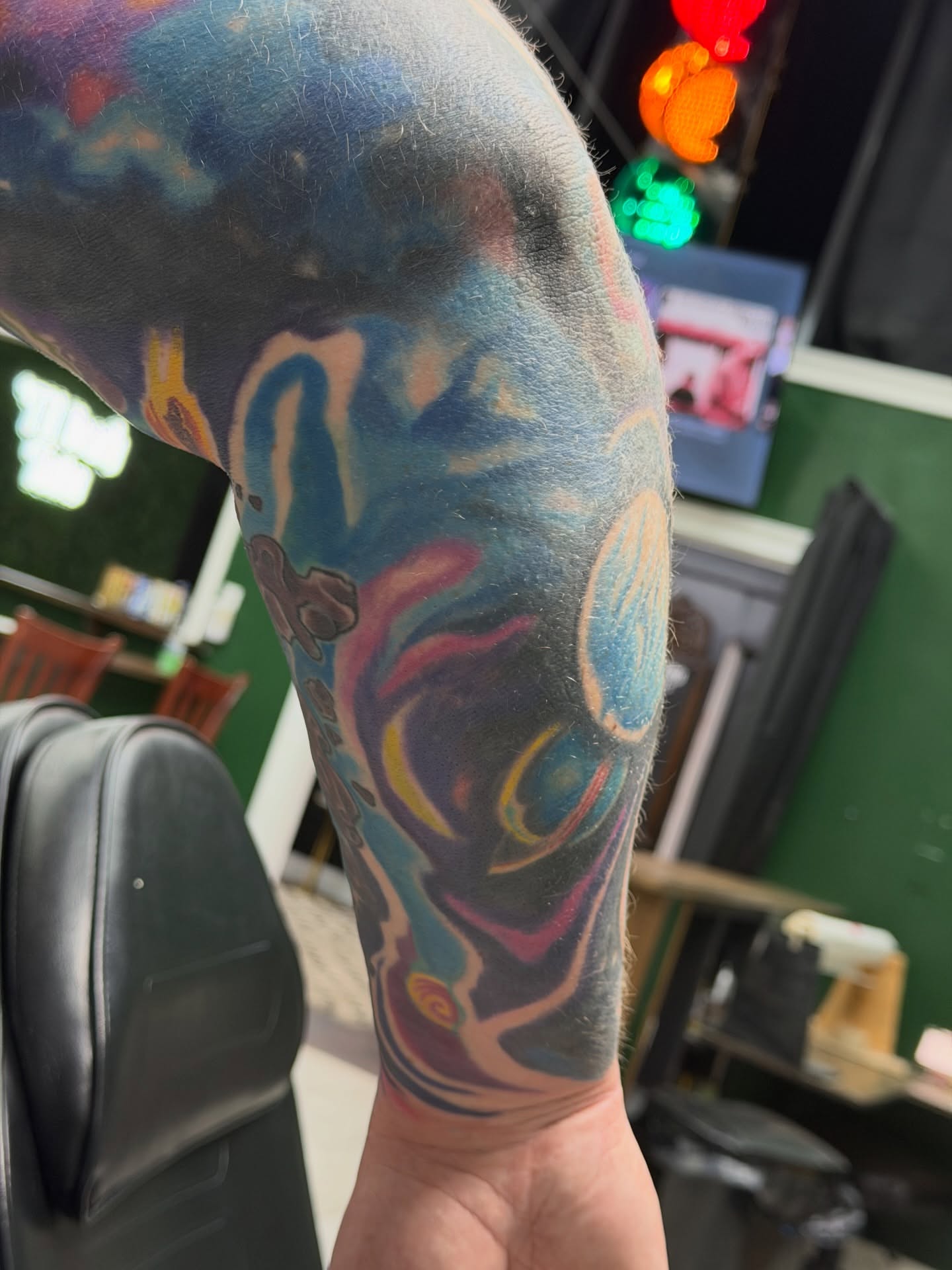 Abstract swirls new school tattoo on the forearm by Squid