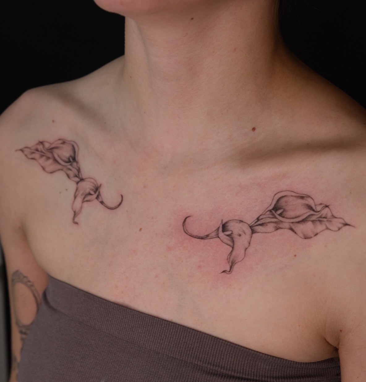 Calla lilies black and grey tattoo on the chest by macie ❥ austin tattoo artist, Austin, Texas