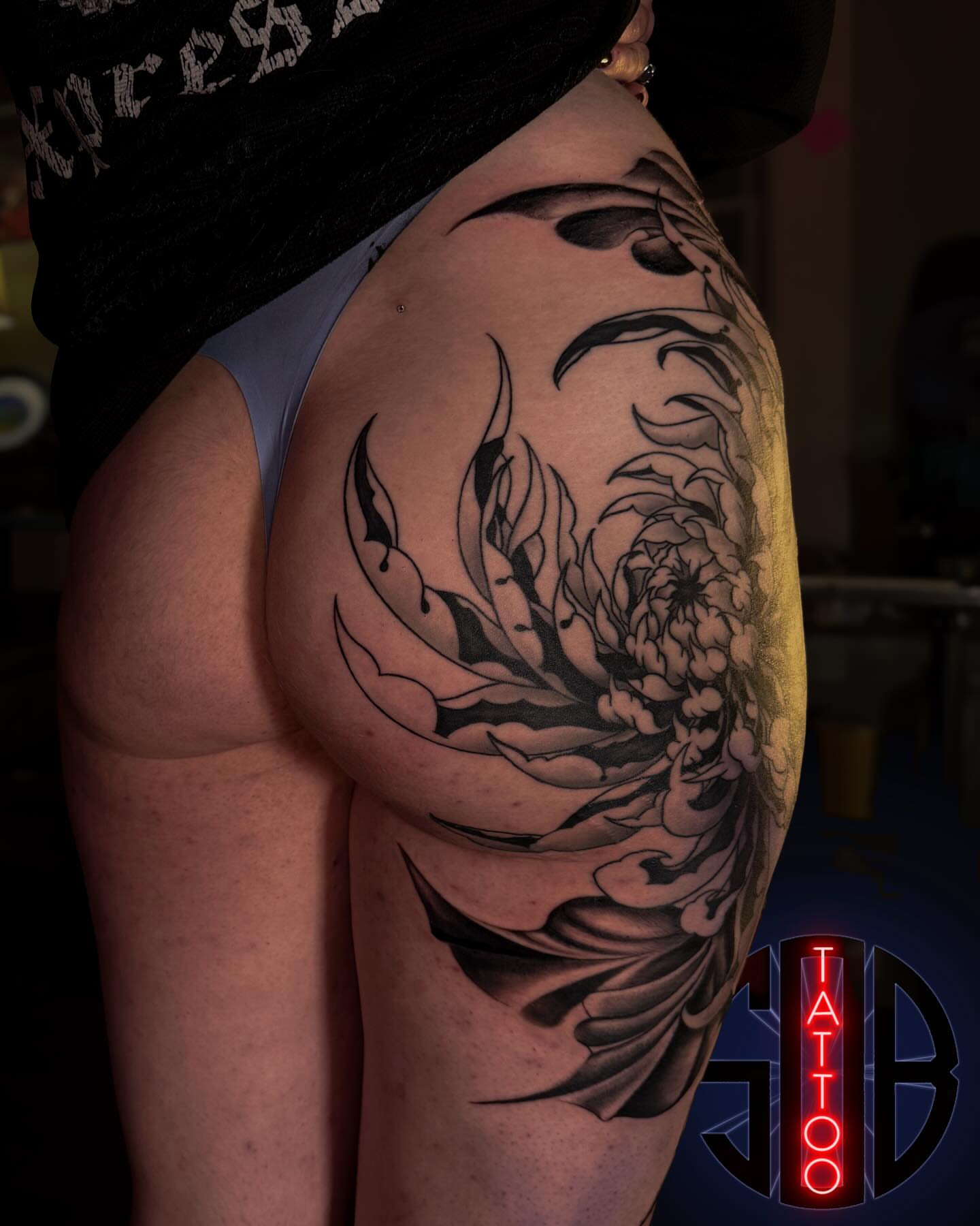 Peony flower realism tattoo on the shoulder by Brandt Norcross