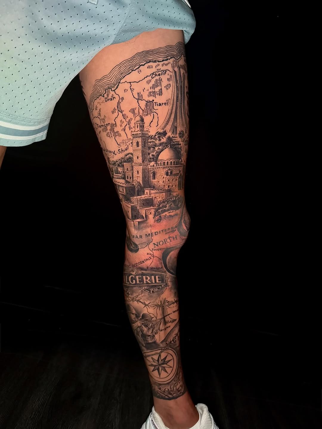 Map and cityscape with historical elements realism tattoo on the leg by ☆ LULU ☆ Licence No. 108595