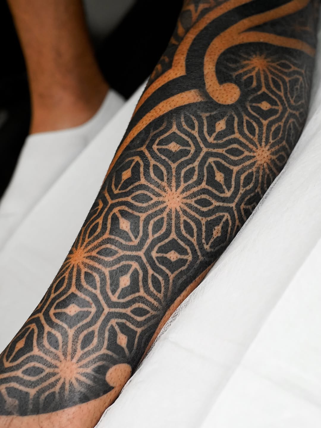 Tattoo by @rjxdots — geometric, blackwork
