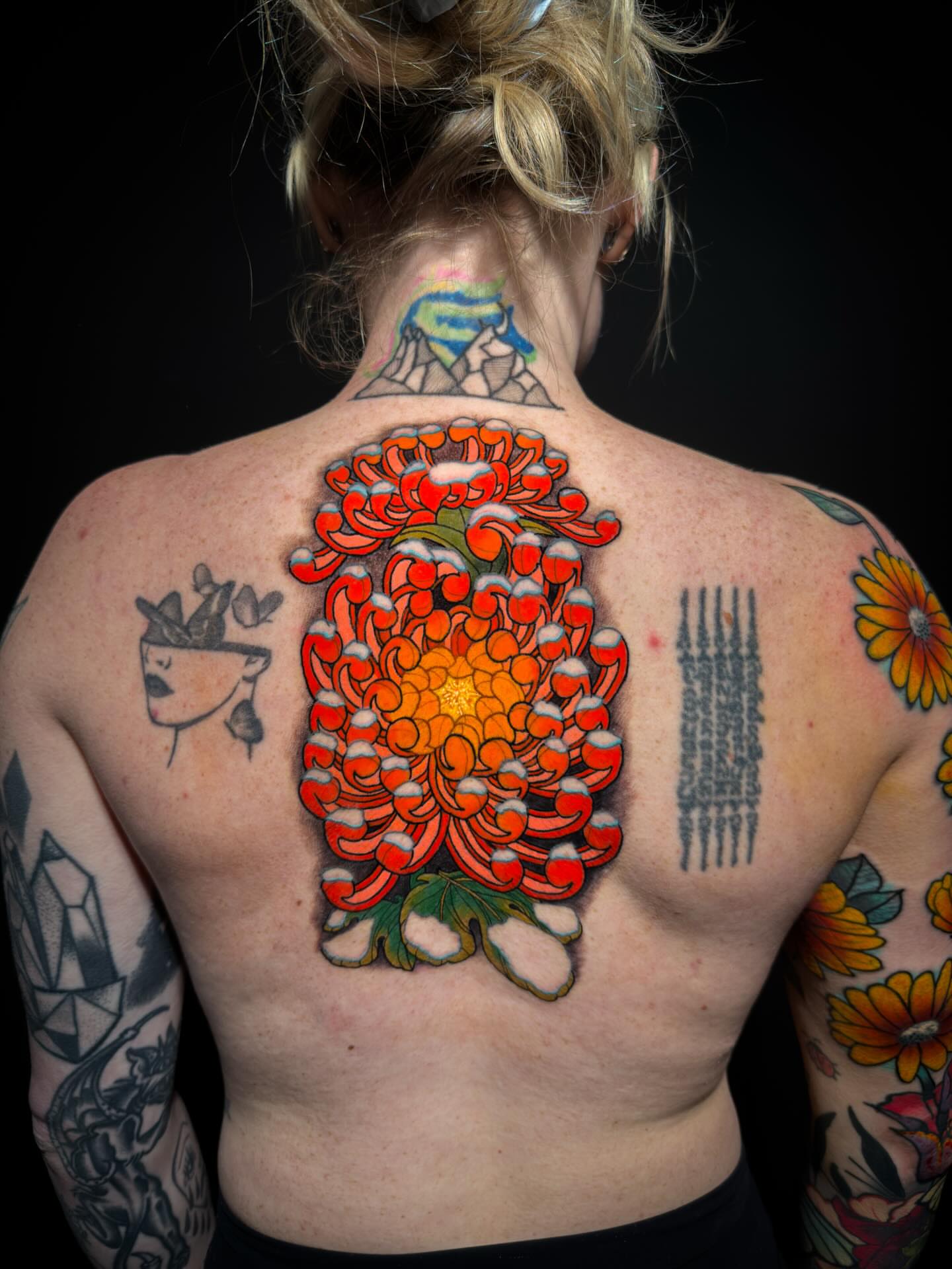 Chrysanthemum japanese irezumi tattoo on the back by Igor Puente
