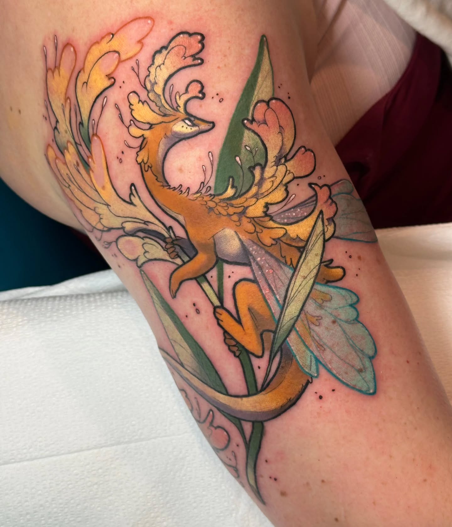 Fox and flowers new school tattoo on the forearm by Sasha Wren