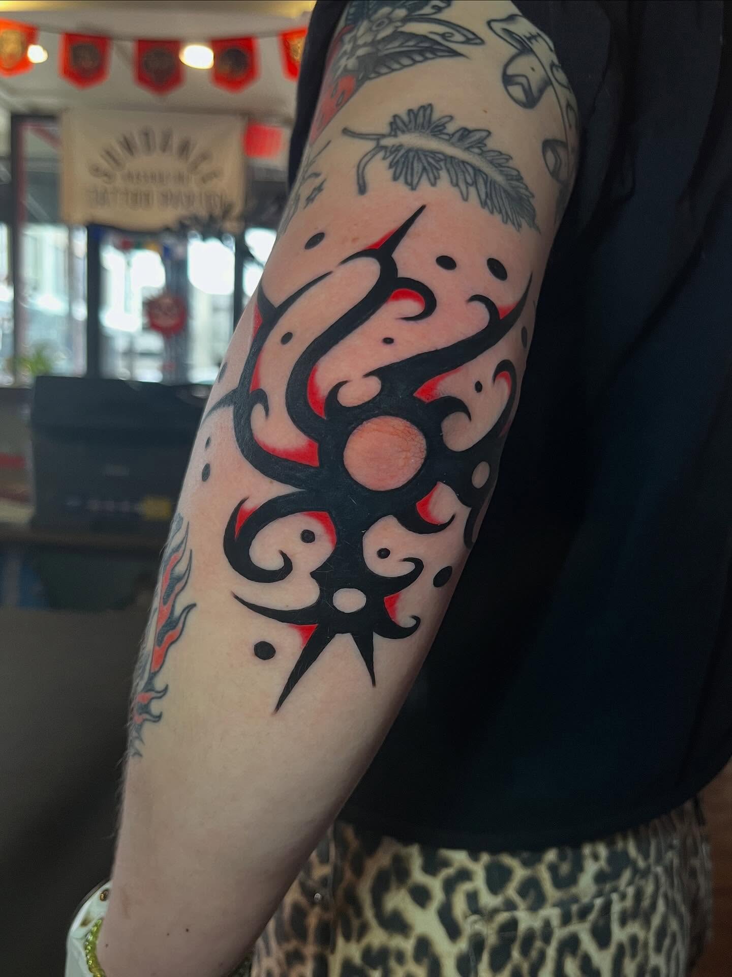 Tribal design tribal tattoo on the forearm by Jake LiCausi