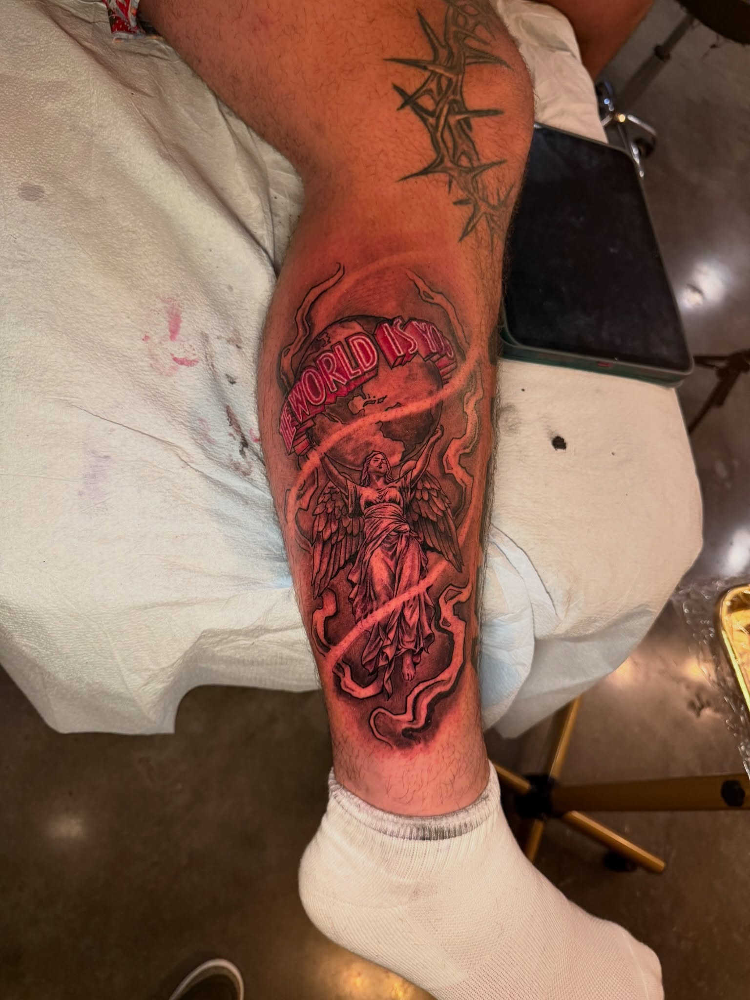Angel with sword neo-traditional tattoo on the forearm by Lemaih Gonzalez