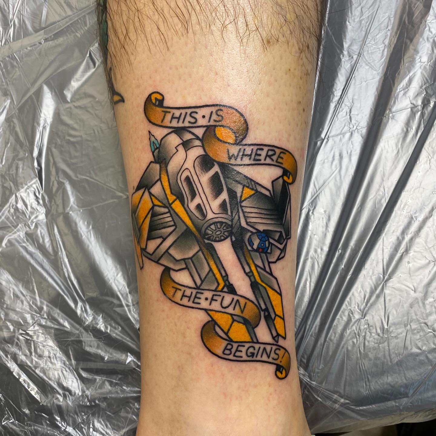 Transformer geometric tattoo on the forearm by Jarid Penn