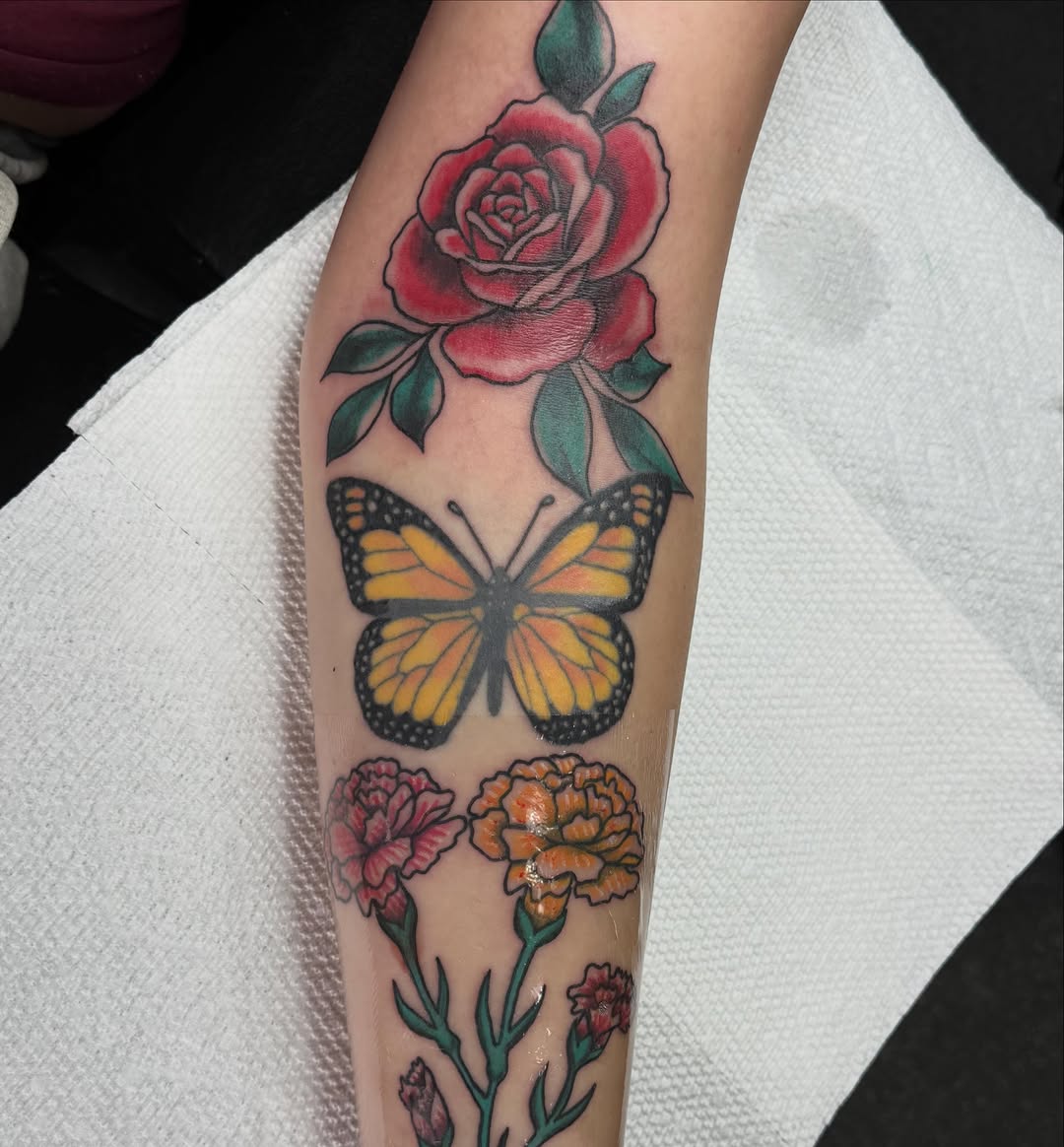 Rose, butterfly, and carnations neo-traditional tattoo on the forearm by 🌛 𐌀𐌋𐌄𐋄𐌉𐌔 🌜
